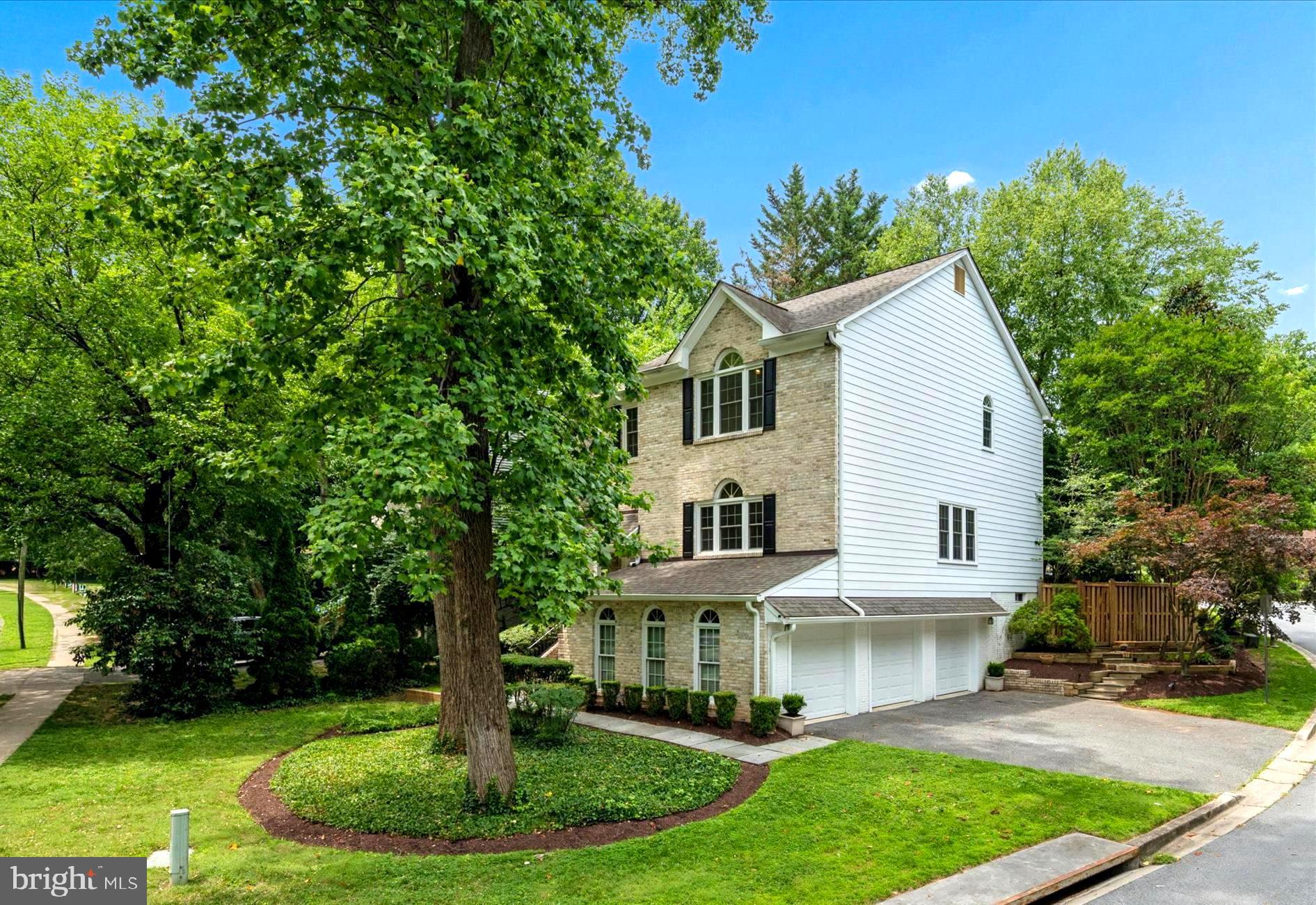 The three magic words of real estate are LOCATION, LOCATION, LOCATION and this magnificent home has it in spades! Perfectly perched on a beautiful home-site in popular WOODSIDE, this sundrenched beauty is filled with all of your favorite things! Outstanding features include a RARE sideloading THREE (3) car garage... (with 3 separate bays) ideal for the car enthusiast or hobbyist. A fabulous sunroom… designed by locally renowned Richard Crone… is accessed via French patio doors from the family room… and is a gorgeous spot to curl up with a good book and enjoy the sights and sounds of nature.  The floorplan is wonderful with a fabulous flexible circulating design. The elegant reception rooms, with nine foot ceilings, are ideal for entertaining on a large scale and hosting holiday dinners. Gleaming hardwood floors are featured throughout the main level and upper hallway with slate floors in the gourmet kitchen. The family room features a floor to ceiling French Boral brick, wood burning fireplace and a handsome wood mantle. All four upper level bedrooms have vaulted ceilings and include the primary, en-suite bedroom and three additional large bedrooms that utilize a second level full bathroom.  Completing the amenities on this upper level are a laundry room, linen closet and a vast upper level landing.  The lower level includes the aforementioned three side loading garages with direct access to a lower level rec room, entertainment room, office or playroom.  Plans have been imagined and are in place for a third, full bath on this level which can be completed prior to moving in. Recent improvements include; an architectural roof, maintenance free energy efficient windows, top-of-the line insulated garage doors, finished and painted garage, lower level ready to receive a full bathroom with plans and rough-in plumbing in place, fenced and private rear yard, professionally landscaping with beautiful shrubs and flowering trees. The rear patio is an oasis in the city and a wonderful perch from which to listen and watch a plethora of songbirds.  Freshly painted and in move-in condition, this is truly a home to delight any commuter, entertainer, gardener, fitness enthusiast and hobbyist … you simply will not find a better home in Woodside! 
 
This brick fronted beauty is mere steps away from the fun filled and fabulous, 3.6 acre, scenic Ellsworth Park! The park is teeming with amenities and includes a large and small breed dog park where your pooch can play off leash. Tennis courts, basketball courts, swing sets, slides, climbing equipment, shaded picnic areas, water fountains, bike racks and all sorts of exercise equipment will have you fit as a fiddle in no time!  After hours of play, you can walk to nearby Zinnia’s and grab coffee, lunch or dinner to enjoy the gardens while your waiter is on the way! Sligo Creek Park is also a short stroll and of course Woodside is home to beautiful gardens and mature tree lined streets.  Access to Metro and the future Purple Line is eight tenths of a mile away and the restaurants and businesses of downtown Silver Spring are even closer!   
 
8900 Ellsworth Court is a rare and wonderful combination of style, size, location, utility, and nature.  Don’t miss this opportunity to have it all.