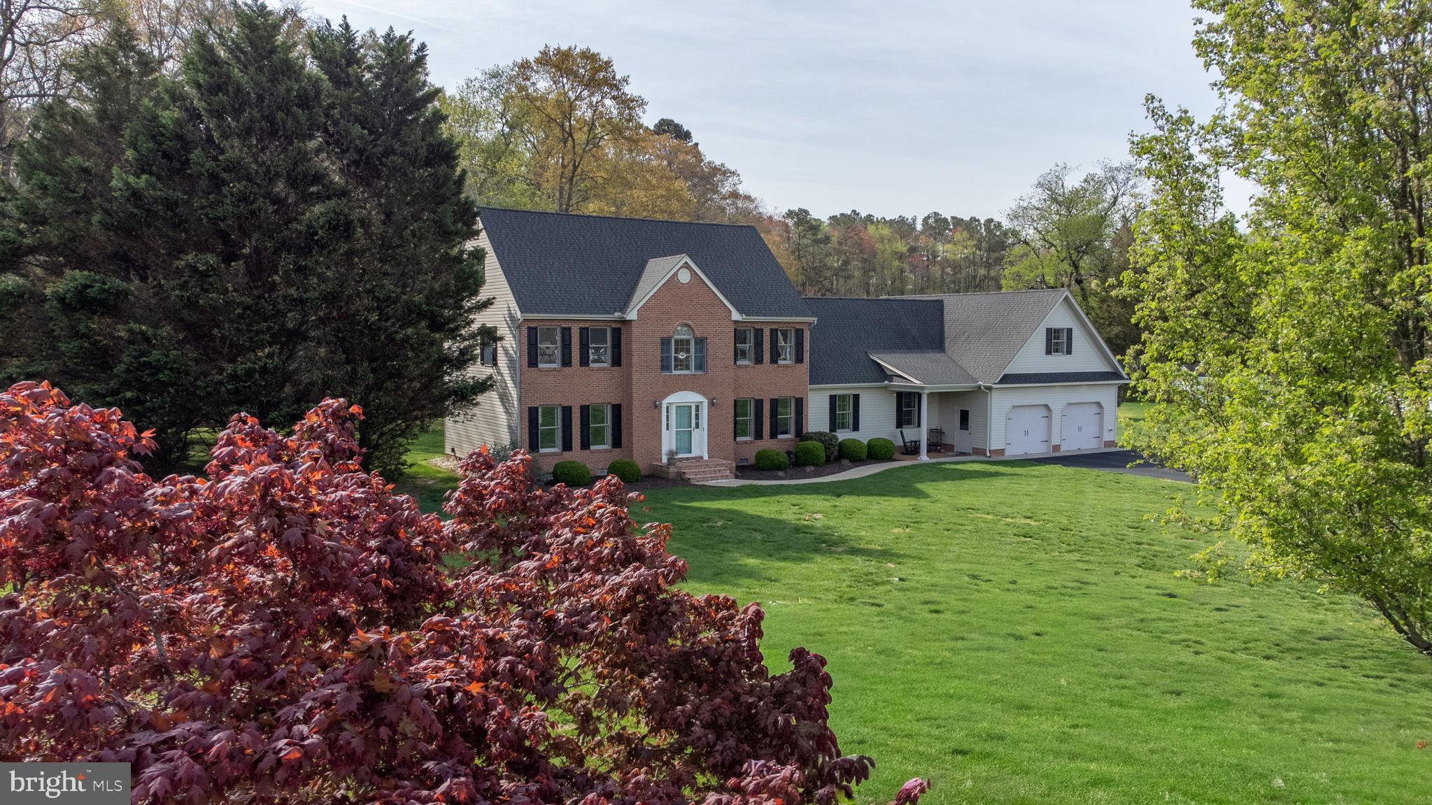 This meticulously maintained 4100 sf+ home in sought after Coulbourn Mill Village offers 5 bedrooms and 3 full baths and many recent upgrades. The kitchen is ready for the gourmet cook with extensive granite counters and island, stainless appliances including a steam oven. The kitchen opens into the family room with beautiful wood floors and gas fireplace, and a rear sunroom with plantation blinds and tile floors. Get out the popcorn and enjoy the large Theater Room complete with projector and surround sound electronics. The primary bedroom en-suite bath features a tile shower, soaking tub and double sinks. There is a second set of steps that lead to a huge 36 x 16 bedroom/game room that is also accessable from the primary bedroom. A 3 zone Geothermal HVAC system (2011) provides savings on utilities and the gameroom has a 4th zone mini-slit system. Step out back through the screened porch to a 36 x 18 pool with surround decking, extensive paver patio and firepit. Very private back yard with beautiful hardwoods and backing to forest. Large 2 car attached and finished garage with a 13 x 12 workshop with outside entry from the pool patio. New roof in 2018 and conditioned crawl space in 2016. Just a short 30 minute drive to Ocean City Md and other local attractions and a few hour to DC and Baltimore metro areas.  Please be sure to view the Fly-Through video which will be posted along with pictures soon! Yes, this home has it ALL!