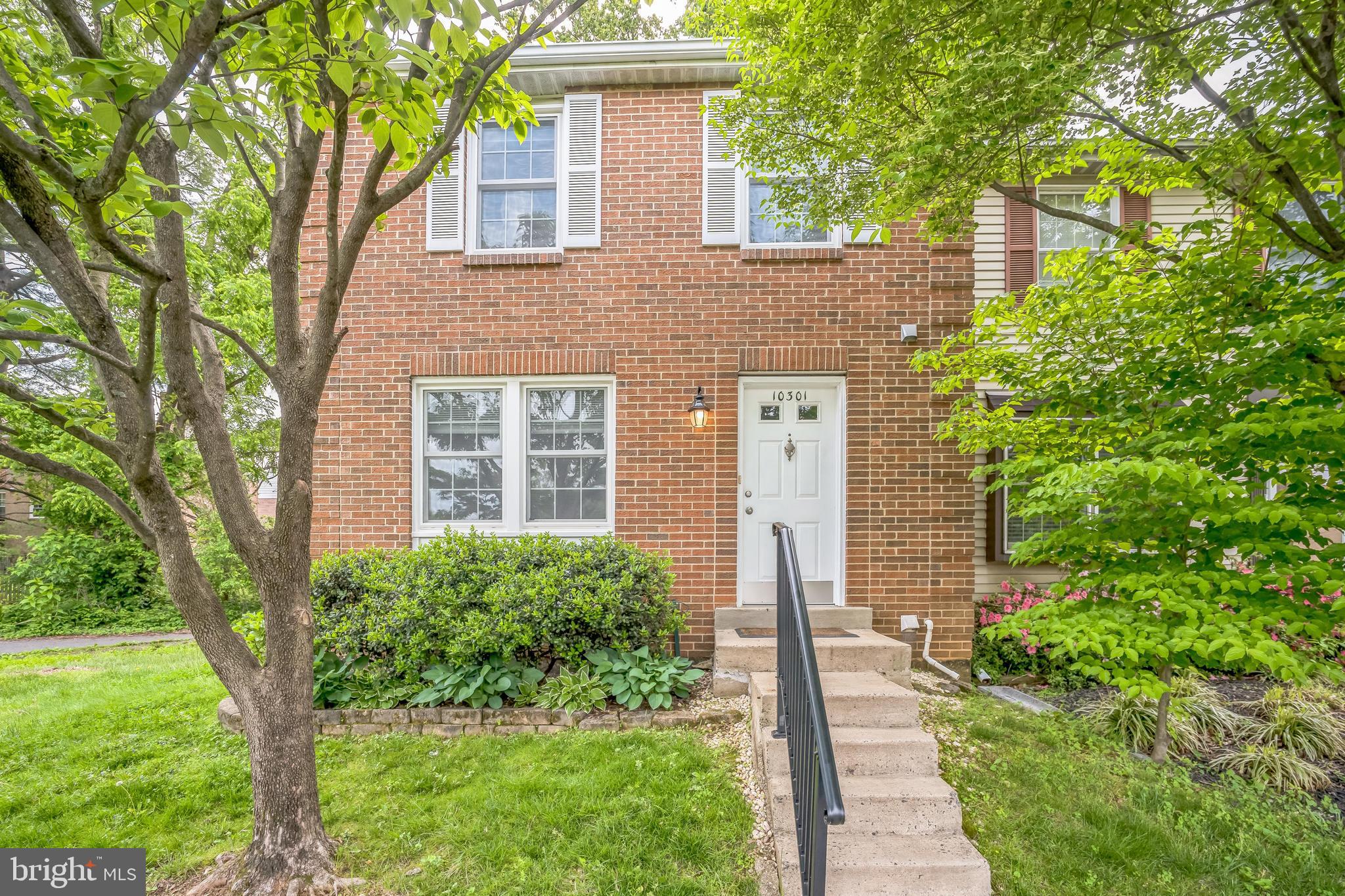 Welcome to this spacious and well-maintained end unit. Step into a welcoming foyer that leads to beautiful Pergo floors throughout the main living areas. The kitchen boasts granite countertops, stainless steel appliances, and ample cabinetry, flowing into a bright dining room with sliding doors that open to an oversized, level deckperfect for outdoor entertaining. The spacious living room offers a comfortable space to gather, while the lower-level recreation/family room features a cozy wood-burning fireplace for added charm. The primary bedroom includes a private en-suite bath for added convenience. Enjoy a fully fenced rear yard. This home combines comfort and function in a desirable location. No pets, please.