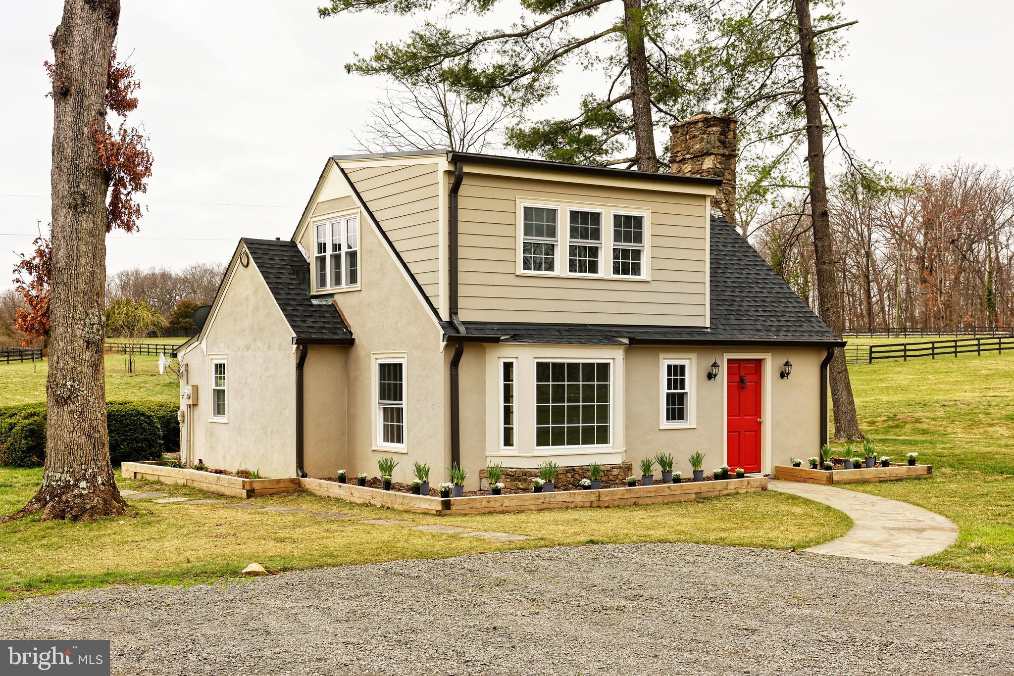 Charming stucco and stone cottage on large horse farm between Middleburg and Upperville. Ideal for 1 or 2 people, this cottage was renovated last year with brand new windows and a shed dormer to expand the 2nd floor.  This provides options for the primary bedroom - either on the main or upper level. Step inside the front door into the delightful living room with gleaming hardwood floors, exposed beams and a stone fireplace. The main level primary BR or family room has carpeting, a bay window and a large closet. The galley kitchen features granite countertops and a picture window overlooking the farm.  The one bathroom has ceramic tile flooring and a combo shower/tub. Attached is the separate storage and laundry room. The spacious upper floor can be the primary bedroom, a guest bedroom or great home office. There is newer flooring, a large closet and westward windows with views of the Blue Ridge mountains. At the back of the house is a covered flagstone deck. Electricity, internet & lawn care INCLUDED in rent. Pets on a case-by case basis. Easy commute to both 50 & I-66. A gem! (Please note the septic capacity allows for only 2 people).