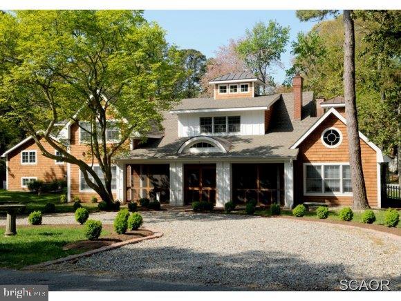Spectacular Home In The Sought After Henlopen Acres. 5700 +/- SF Carefully Renovated To Maintain Original Charm, Yet Feature All Of Today's Luxuries. Beautiful Pecky Cypress Paneling, 4 Fireplaces, H/W Flrs, Marble Baths, Cozy Screened Porch, Carriage House & More. Large Corner Lot Perfect For Pool.