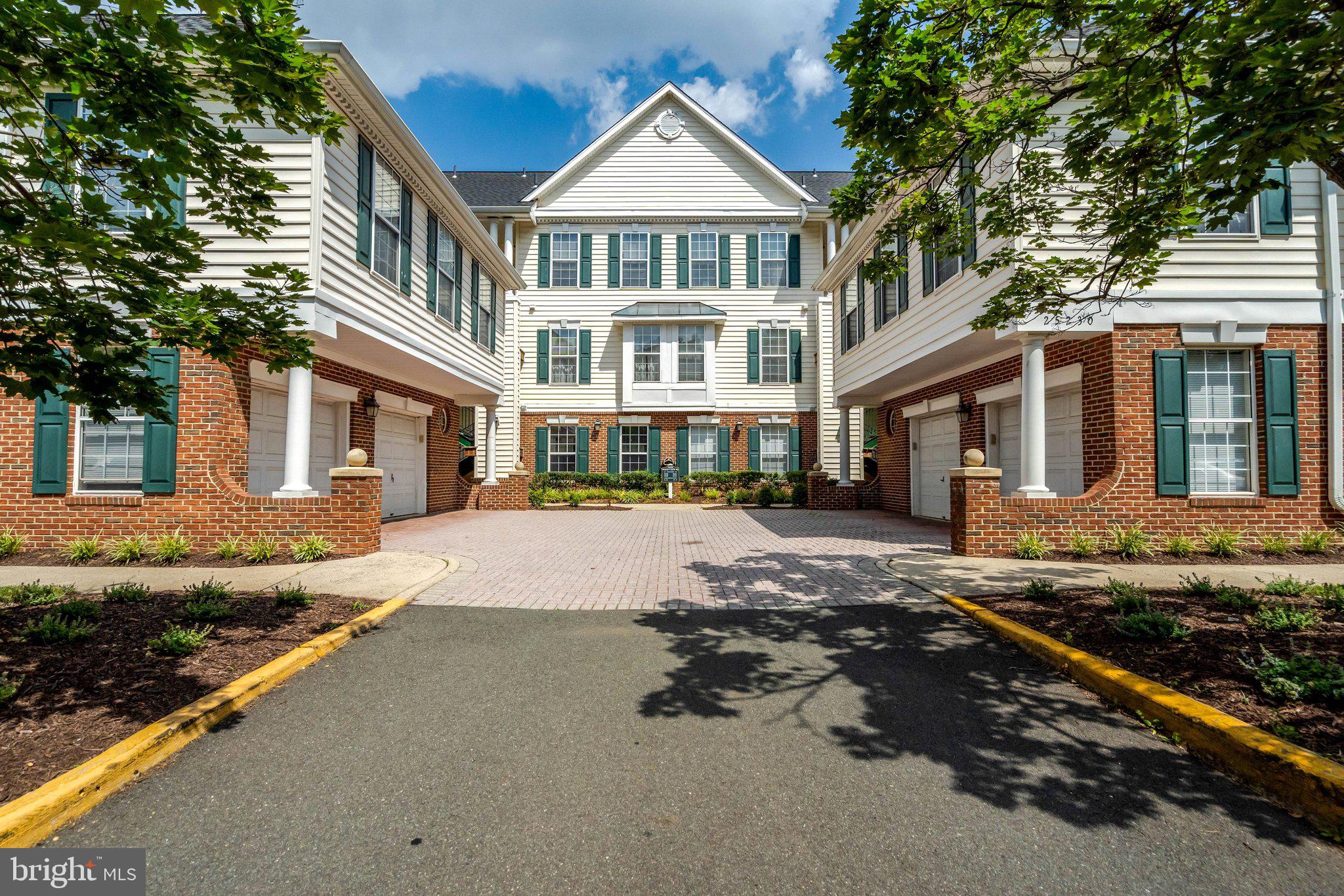 EASY ONE LEVEL LIVING WITH NO STAIRS*VIEWS OF THE POND WITH WALKING TRAILS AROUND IT*2 BEDROOMS, 2 BATHS & AMPLE OPEN PARKING SPOTS IN FRONT OF UNIT*OPEN FLOWING FLOOR PLAN*LIGHT & BRIGHT THROUGHOUT*WIDE PLANK FLOORING, 9 FOOT CEILINGS, RECESSED LIGHTING & CROWN MOLDING THROUGHOUT*FRONT FOYER WITH DOUBLE DOOR CLOSET*LARGE OPEN FAMILY ROOM WITH GAS FIREPLACE & WOOD MANTEL*LIVING ROOM WITH CHANDELIER*BEAUTIFUL GOURMET KITCHEN FEATURES GRANITE COUNTERTOPS, ALL STAINLESS STEEL APPLIANCES, 42 INCH CABNETS WITH UNDER CABINET LIGHTING & CERAMIC TILE BACKSPLASH*5 BURNER GAS STOVE, SIDE BY SIDE REFRIGERATOR WITH ICE MAKER, DISHWASHER, MICROWAVE & FULL SIZED FARMHOUSE STAINLESS STEEL SINK*PANTRY & BREAKFAST BAR OVERHANG FOR CHAIRS*UNIQUE BARN DOORS OPEN TO FULL SIZE WASHER & DRYER*WALK OUT TO COVERED PATIO WITH VIEWS OF THE POND*PRIMARY BEDROOM WITH CEILING FAN & 2 WALK IN CLOSETS*PRIMARY BATH WITH CERAMIC TILE FLOOR*2ND BEDROOM WITH CEILING FAN & CLOSET*2ND FULL BATH WITH 12X12 CERAMIC TILE FLOOR*LOCATED NEXT TO SOUTH RIDING TOWN CENTER SHOPPING CENTER WITH RETAIL, RESTAURANTS & STARBUCKS*ENJOY ALL OF SOUTH RIDING AMENITIES*