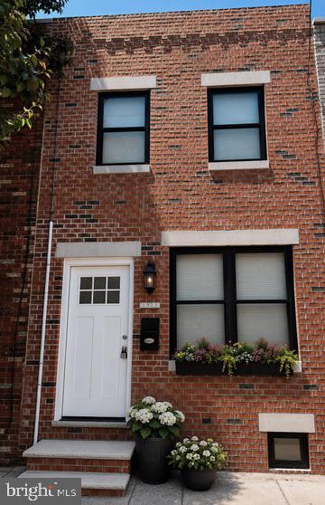 High Street FInance has pre-approved investor financing for this renovation project which is priced $200k below nearby comps.  

Welcome to 1928 S. Camac Street, a classic brick rowhome nestled on one of the most desirable blocks in Philadelphia's vibrant East Passyunk neighborhood. This charming residence offers approximately 836 square feet of living space with 2 bedrooms, 1 full bath, basement, and a private rear yard—providing the perfect opportunity for a homeowner or investor to create a truly exceptional city home.

The existing layout features an open living and dining area, hardwood floors, and a rear kitchen with direct access to the backyard. The basement adds valuable bonus living space and laundry area, while the second floor offers two comfortable bedrooms and a full bath. The property presents an outstanding opportunity for cosmetic updating or a complete designer renovation to maximize value.

Location is everything, and this home delivers. Just steps from the acclaimed restaurants, cafés, boutiques, and nightlife of East Passyunk Avenue, you'll enjoy one of Philadelphia's premier walkable neighborhoods. Nearby parks, public transportation, Center City, the Sports Complex, and major highways are all within easy reach, making this an ideal location for both owner-occupants and investors.

Whether you're looking for your next personal residence, a stylish city retreat, or an investment in one of South Philadelphia's strongest neighborhoods, 1928 S. Camac Street offers tremendous upside and exceptional long-term value.