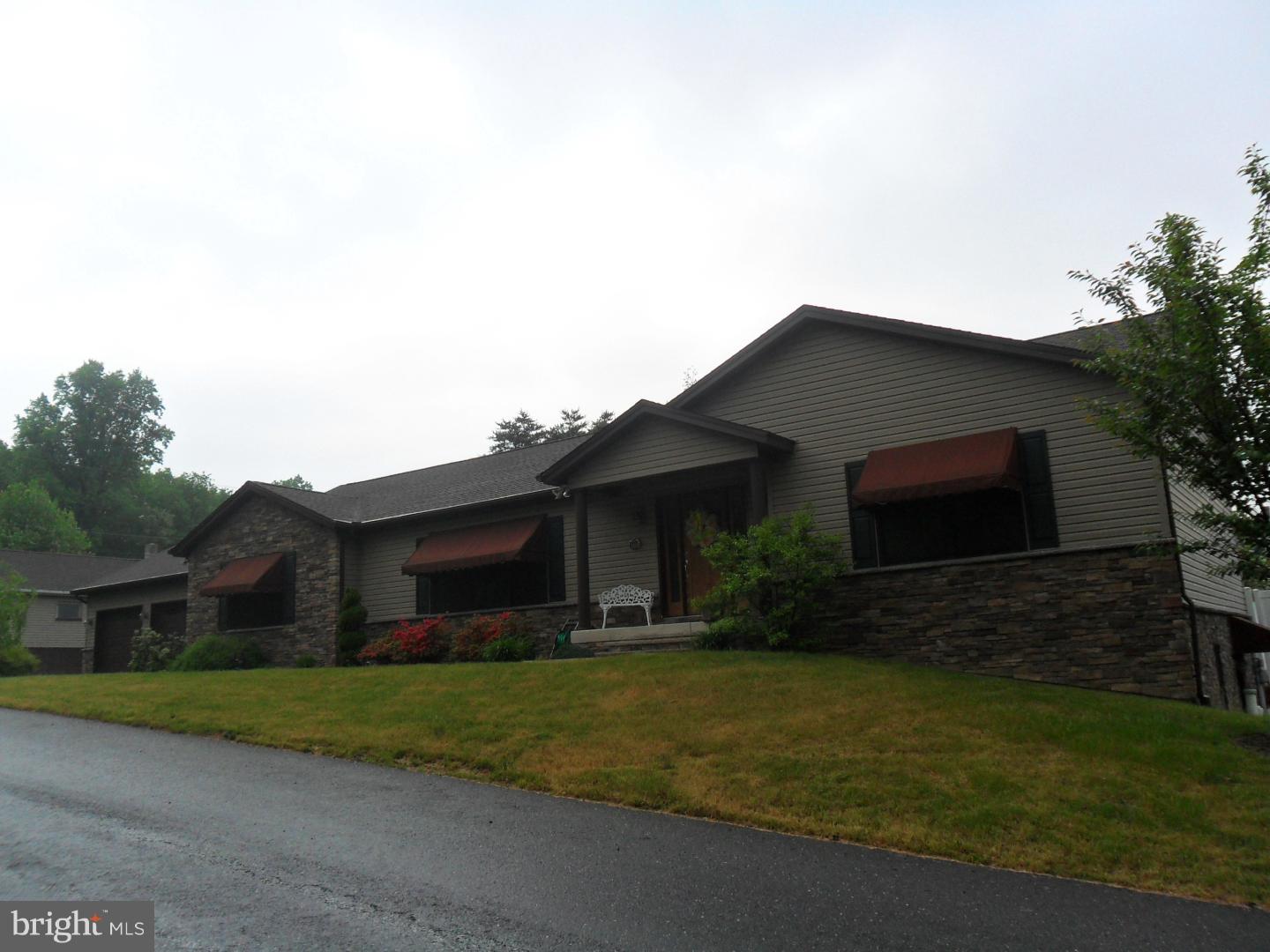Well cared for and thought out Ranch home with open floor plan. Spectacular cooks kitchen with granite, cherry soft close cabinets, stainless steel appliances, vegetable sink in center island, tile back-splash and farm sink. Finished lower level includes a wet bar 10'5x7'10, game area 18'6x17'3, and lots of storage. Cathedral ceiling in living room with propane fireplace. On demand water heater, pex plumbing, full house generator, kohler fixtures throughout, gutter covers. Central vac in home and 36x23 over sized garage with 3 separate doors.