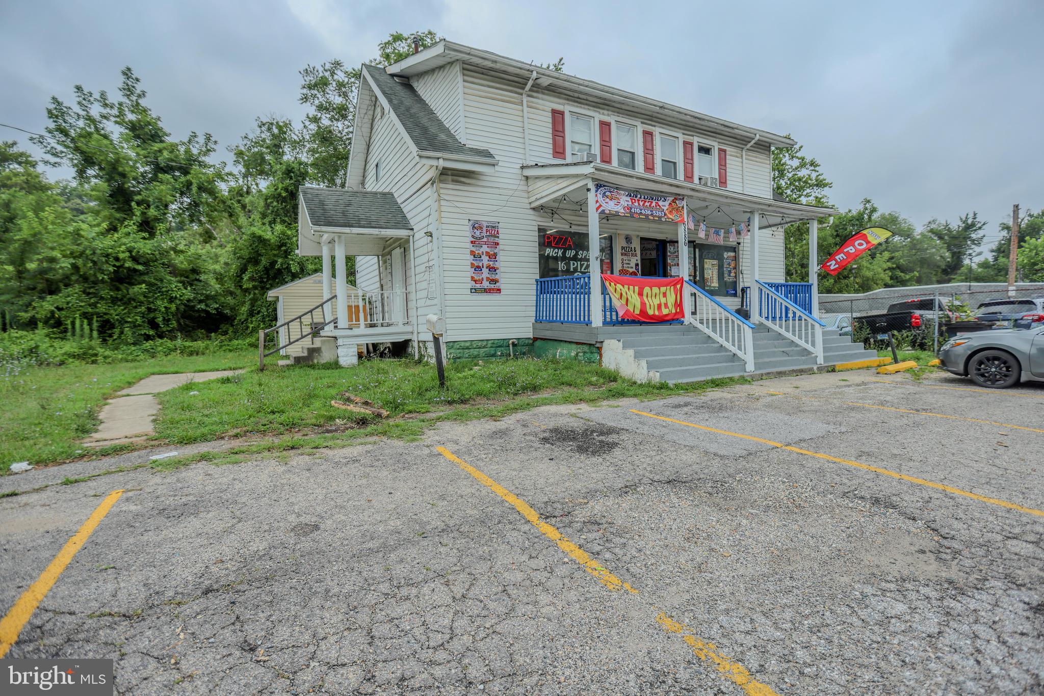 This commercial building is for sale and includes a major added benefit: the new owner can take over the fully operational pizza business with all its equipment at no additional cost. The property, currently assessed at $693,100, presents a value-add opportunity with some needed renovations, offering instant equity and additional income potential from four rental bedrooms, full bathroom. Appointments for viewing the commercial space can be scheduled from 1 PM to 8 PM with 24 hours notice.