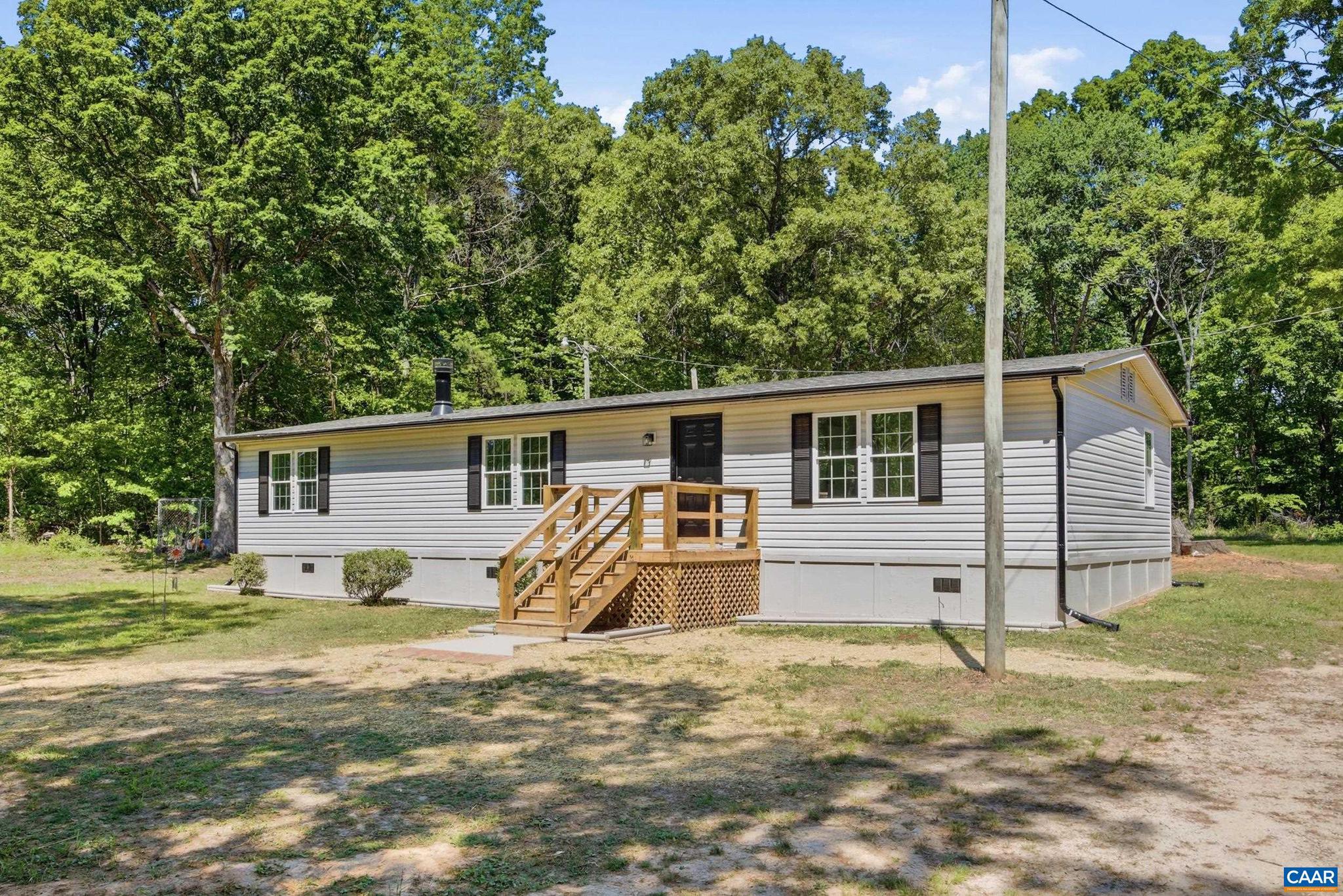 LIKE NEW!!  Remodeled 3 bed/2 bath home mintutes from the quaint town of Louisa. New HVAC, roof, kitchen, floors and more!