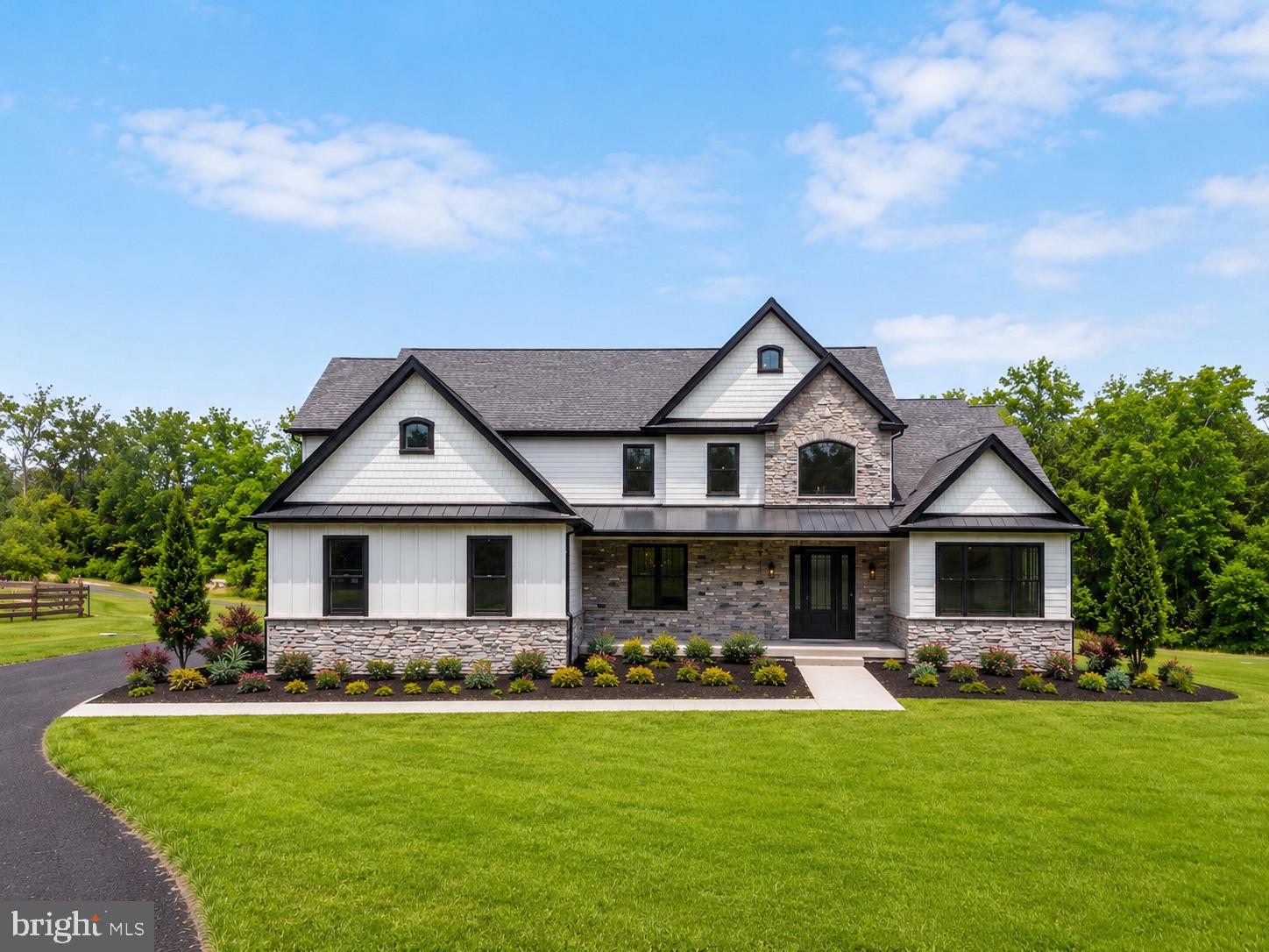 Welcome to Reading Creek Estates, an exclusive new construction opportunity by premier local builder Senior Construction, set on a scenic and private homesite in beautiful Chalfont. This exceptional 5bed/4.5bath home is nearing completion and showcases carefully selected high-end finishes, timeless design, and quality craftsmanship throughout, allowing the future owner to enjoy a truly elevated living experience.

A standout and highly desirable feature of this residence is the presence of two luxurious primary suites, thoughtfully designed to offer flexibility, comfort, and privacy. The first-floor suite is ideal as a private guest retreat or multigenerational living space, while the expansive second-floor primary suite serves as a true sanctuary, complete with a spa-inspired bath and impressively large closets designed for both beauty and function.

Inside, a bright and open layout is complemented by soaring 10-foot ceilings on the main level, 9-foot ceilings upstairs, custom millwork, and Marvin windows that fill the home with natural light while framing peaceful views of the surrounding landscape.

The gourmet kitchen anchors the home with a large center island, premium finishes, and seamless flow into the breakfast area and great room, where a fireplace creates a warm and inviting space for both everyday living and entertaining.

Upstairs, additional bedrooms offer generous space and comfort, including one connected by a convenient Jack-and-Jill bathroom. A spacious bonus room provides flexibility for a media room, playroom, home office, or lounge.

Luxury continues throughout with beautifully appointed baths, upgraded hardwood flooring, a full basement with exterior access, three-zone heating and central air, propane gas heat, and a spacious three-car garage.

Outdoor living is just as inviting, featuring a covered rear patio with a fireplace, the perfect setting for relaxing evenings or entertaining guests. Beyond the backyard, the home overlooks protected farmland, preserving the sweeping scenic views and offering a rare sense of privacy, openness, and natural beauty that will remain unchanged.

Ideally located close to the train, shopping, dining, and major routes, and within the award-winning Central Bucks School District, this remarkable home offers an exceptional blend of privacy, craftsmanship, and convenience in one of Bucks County’s most desirable new communities.