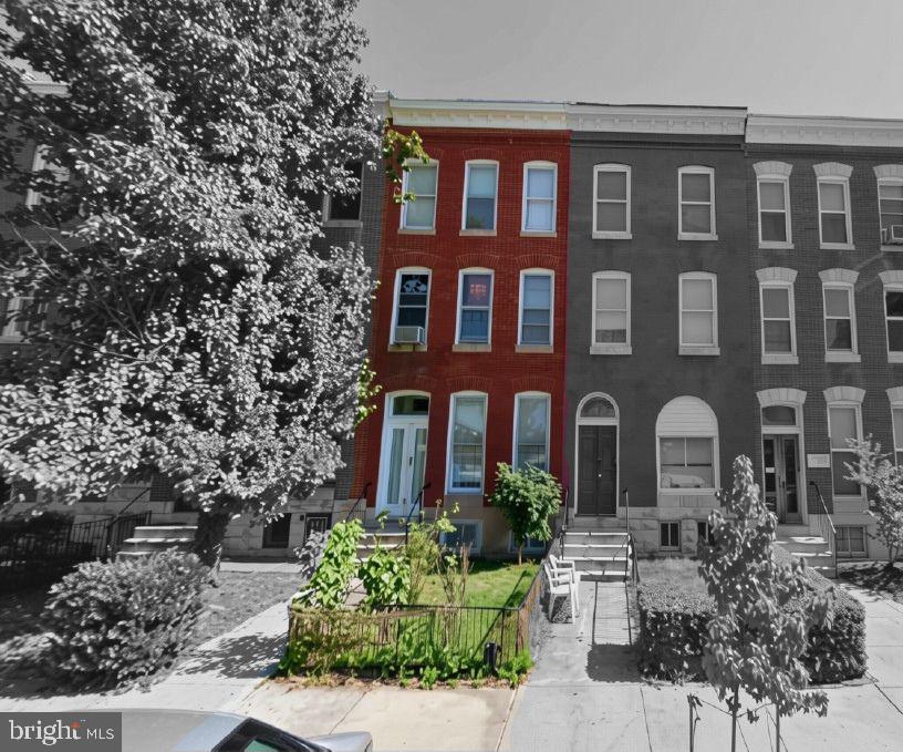 2407 Maryland Avenue presents a three-unit apartment building in Baltimore's Old Goucher neighborhood, offering investors immediate income with meaningful upside. Simply bringing the existing rents to current market levels is projected to increase gross rental income by nearly $1,000 per month, resulting in a projected 10.4% return on investment—all without requiring extensive renovations.

The property has been under long-term ownership and reflects deferred maintenance and cosmetic wear consistent with many years of ownership. Investors have the flexibility to execute an improvement strategy that matches their budget and investment goals, whether through routine cosmetic updates, mid-grade renovations, complete apartment rehabs as units become available, or capital improvements to the building's systems and common areas. Additional improvements beyond market rent alignment may support even stronger rental performance and long-term appreciation.

Located in the heart of Old Goucher, residents enjoy walkable access to Johns Hopkins University Homewood Campus, Penn Station, the Station North Arts District, and the Charles Village commercial corridor. With approximately 85% of neighborhood residents renting their homes, Old Goucher continues to provide a deep tenant pool supported by nearby employers, universities, restaurants, and public transportation.