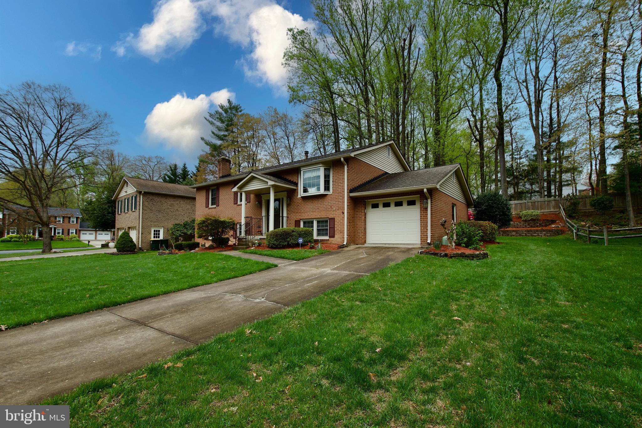 WELCOME TO THIS UPDATED HOME BLENDING COMFORT CONVENIENCE!THE OPEN-CONCEPT KITCHEN/ FAMILY ROOM SERVE AS THE HEART OF THE HOME, PERFECT FOR MODERN LIVING AND ENTERTAINING!THE LIVING ROOM'S BAY WINDOW & HIGH CEILING ADD BRIGHTNESS AND SPACIOUSNESS  TO THE AREA. THERE ARE HARDWOOD FLOORS IN LR AND 3 BRS ON MAIN LEVEL. THE RENOVATED KITCHEN FEATURES GLEAMING CERAMIC FLOORS AND PLENTIFUL CABINETRY PLUS  ACCESS TO A 20X12 DECK WITH A RETRACTABLE AWNING IDEAL FOR GRILLING OR HOSTING GUESTS. GRANITE COUNTERS AND A BACKSPLASH SET OFF NEWER CABINETRY AND APPLIANCES.LOWER LEVEL HAS 2 MORE GENEROUS BEDROOMS AND A FULL BATH WITH TUB. OVERSIZED RECREATION ROOM OFFERS A PERFECT BALANCE OF FUN AND RELAXATION WITH AMPLE SPACE FOR A GAME TABLE AND A COZY TV AREA ENHANCED WITH SURROUND SOUND.A GAS FIREPLACE WITH A BRICK WALL /RAISED HEARTH FIREPLACE CREATES A WELCOMING AMBIANCE . ADDITIONAL HIGHLIGHES INCLUDE A SINGLE CAR GARAGE PLUS EXTRA DRIVEWAY PARKING, ENSURING CONVENIENCE FOR HOMEOWNERS AND GUESTS ALIKE. THIS HOME COMBINES FUNCTIONALITY AND LIVABILITY FOR THE EVERYDAY LIVING EXPERIENCE.THIS HOME IS PERFECTLY LOCATED  CLOSE TO SHOPPING, SCHOOLS, BUSES, VRE, SPRINGFIELD METRO AND FAIRFAX COUNTY PARKWAY OFFERING  ACCESS TO MAJOR COMMUTER ROUTES.