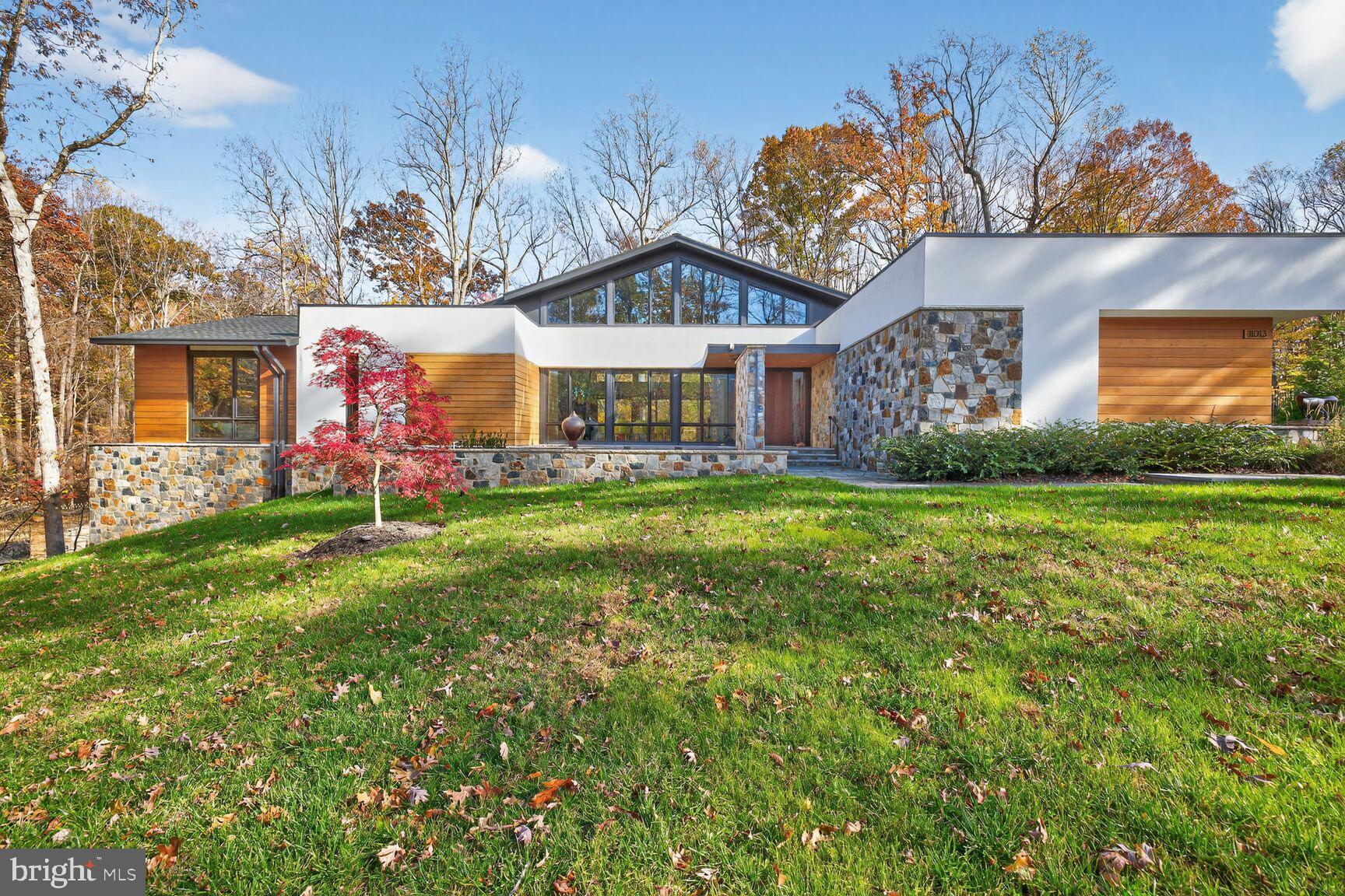 Californian Custom! Modern Craftsmanship Meets Timeless Elegance, just outside of DC in Potomac, MD. 

4 Beds | 4 Baths | 6,600 Sq Ft | 2.07 Acres | Built 2022 
Experience the perfect fusion of modern design and timeless sophistication in this custom-built, award winning 2022 residence, nestled on over two acres of private, park like grounds in the heart of Potomac. Inspired by Californian contemporary architecture, this single level masterpiece offers 6,600 square feet of light filled living, meticulously crafted with rare unity materials, bespoke finishes, and exceptional attention to detail. Designed for one floor living, the home’s open layout seamlessly blends indoor and outdoor spaces through expansive walls of glass and soaring ceilings. Each room is thoughtfully positioned to capture tranquil views and abundant natural light. The main level features three spacious bedrooms and three full baths, including an elegant primary suite with a spa inspired bath, two oversized walk in closets, blackout privacy windows and a private lounge. The chef’s kitchen is a true centerpiece featuring custom cabinetry, waterfall island, premium appliances, all opening to a dramatic great room ideal for both entertaining and relaxation. The lower level adds versatility with a fourth bedroom and full bath, a third living area, a fully equipped gym, and a walkout terrace that extends to beautifully landscaped and hardscaped grounds.
Additional highlights include:
Fully furnished.
Expansive great room with walls of glass detailing and designer finishes.
Architectural detailing and high end materials throughout.
Two car attached garage with ample storage.
Floor-to-ceiling windows and exceptional natural light throughout.
Professionally landscaped outdoor spaces offering complete privacy.
Enjoy the ease of single level living paired with sophisticated style and craftsmanship rarely found at this level. This Potomac residence embodies modern luxury, privacy, and design excellence, a true Californian custom home reimagined for East Coast living.