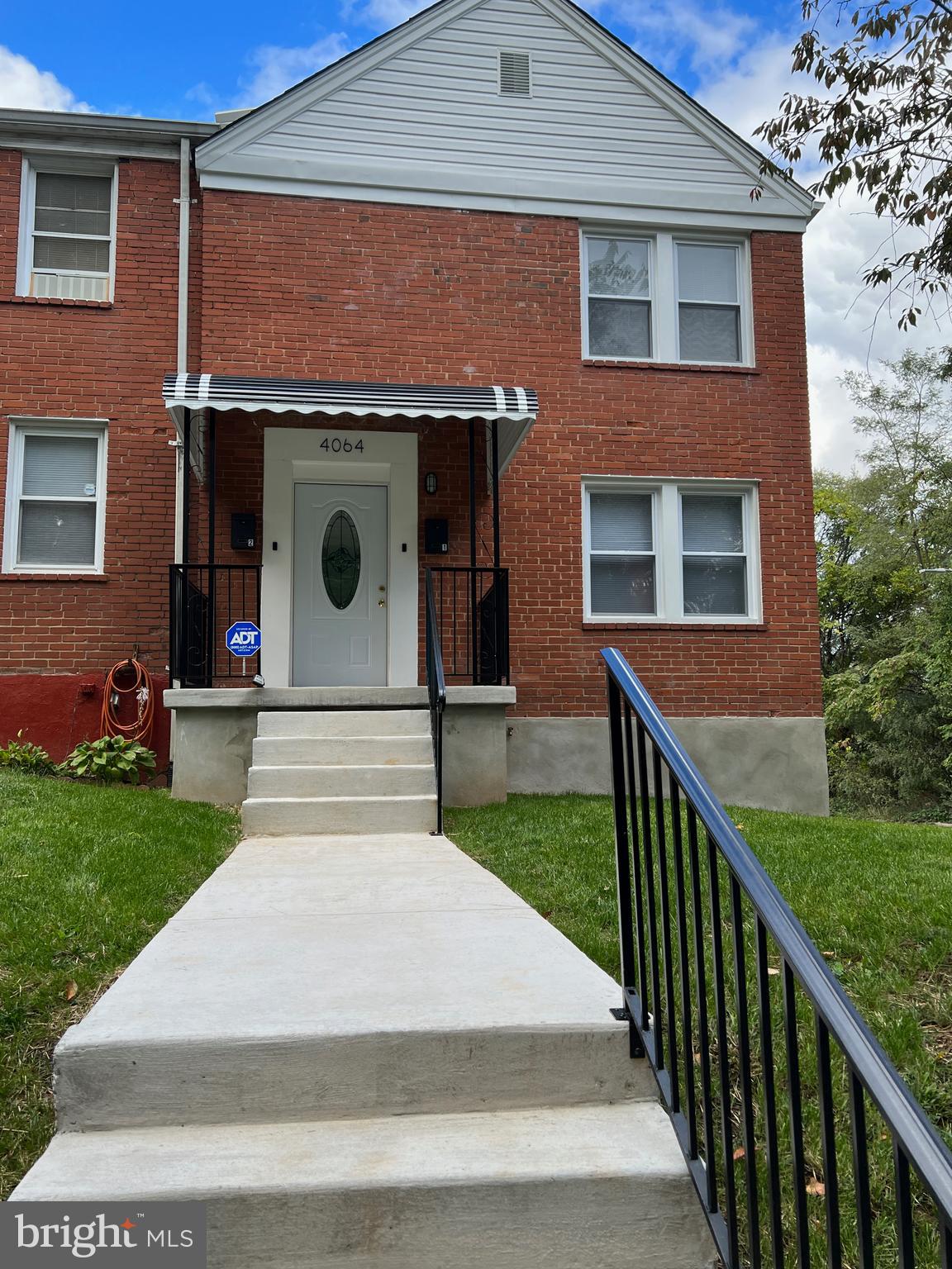 Beautifully renovated and updated one bedroom apartment. New appliances, new hardwood floors, updated kitchen. Modernized bathroom. Front facing LR. Large deck off kitchen. Off street parking via easy access driveway.  Entrance/exit house from front or rear of property.  Full access to shared front porch. Coin-operated laundry  on lower level with utility sink. Fully secured with private access.