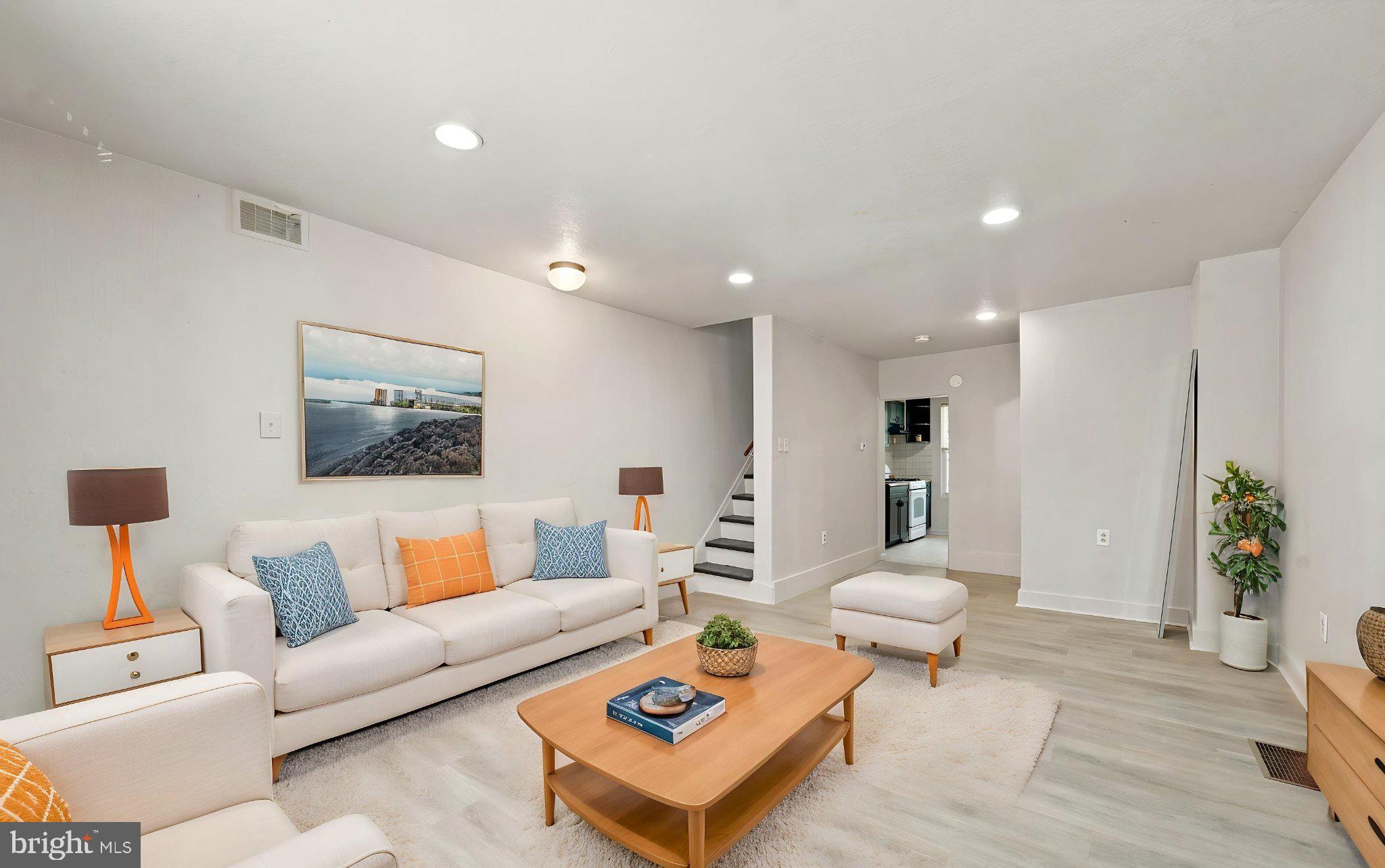 The best deal in Point Breeze is right here and it will not last!
Welcome to 2015 Mountain St, a freshly renovated 3 bedroom, 1.5 bath rowhome in the heart of South Philly's hottest neighborhood, priced at $250,000. From the moment you walk in, you will notice the attention to detail: luxury vinyl plank flooring runs throughout the main living areas, recessed lighting illuminates every room, and fresh neutral paint makes the whole space feel bright and move in ready.
The kitchen has been updated with dark cabinetry, tile backsplash, and a gas range. A convenient powder room on the first floor makes this home extremely practical. Upstairs, three bedrooms each feature new hardwood flooring and ample natural light. The full bathroom includes a tub and shower combo with a sleek updated vanity. The layout flows naturally toward the rear of the home where you can access the patio. 
Head downstairs to a full basement with laundry hookups and washer and dryer already in place, plus a central air hookup ready for your system. Out back, a private concrete patio gives you your own outdoor space in the city.
At $250,000 in a neighborhood where comparable homes routinely sell for more, this is the kind of opportunity that comes around once. Whether you are a first time buyer building equity or an investor adding a turnkey asset to your portfolio, the math works and the home shows well.
Schedule your showing today. This one will not sit.