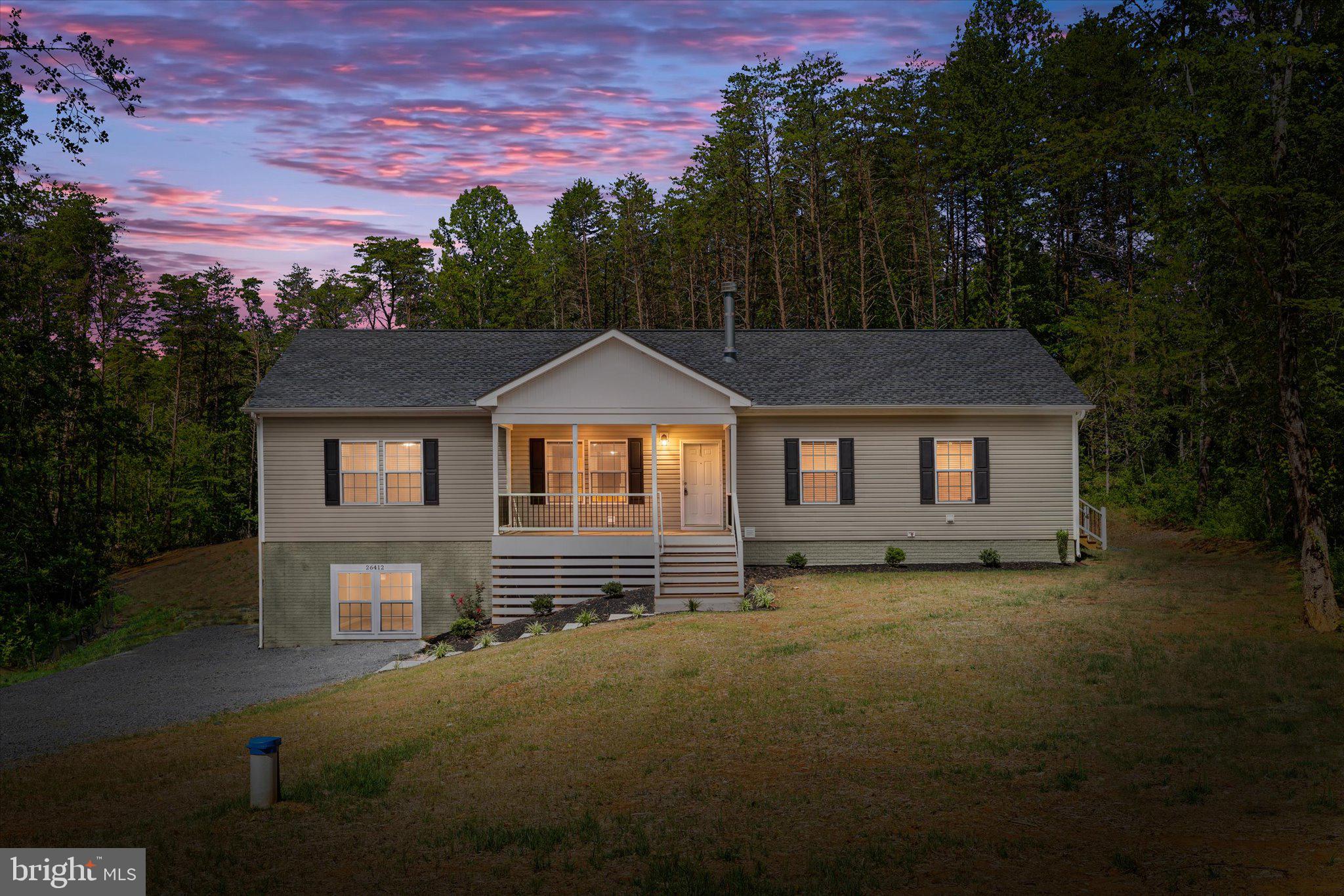 Brand-new 3BR/2BA rambler on 3+ private acres in Orange County — move-in ready today! Nearly 1,900 sq ft of single-level living with an open-concept layout, oversized kitchen island, stainless appliances, and vinyl flooring throughout. The primary suite features dual vanities and a walk-in shower. Enjoy your morning coffee on the covered front porch or unwind on the rear deck overlooking a cleared yard with a wooded perimeter for privacy. Full unfinished basement is prepped and ready for your vision — add a rec room, home office, or fourth bedroom down the road. Well, septic, and Firefly fiber already in place. No HOA. Tucked at the end of a quiet cul-de-sac in Terry's Run Estates, just minutes from Rt. 20 and Lake Anna. Rural peace with modern convenience — come see it for yourself.
