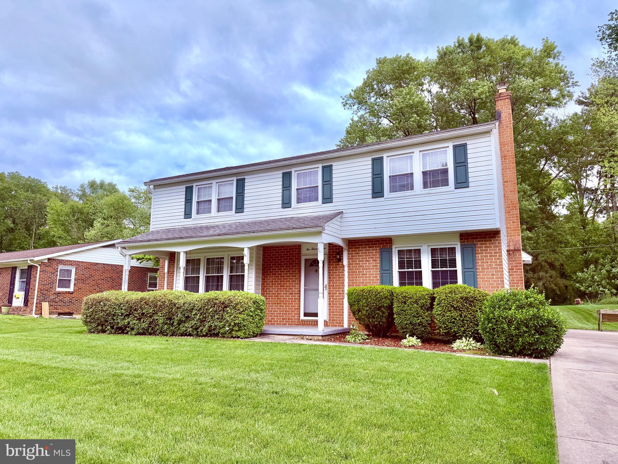 Rare 5-bedroom colonial featuring all 5 bedrooms and 2 full baths on the upper level—an exceptional and hard-to-find layout! The main level offers a formal living room, formal dining room, eat-in kitchen, laundry room, half bath, and a spacious family room with a cozy gas fireplace. Unimproved basement with exterior side entrance and windows provides endless potential. Enjoy gas heat, replacement windows, and a welcoming covered front porch. Located in Forest Hill with generously sized rooms throughout.