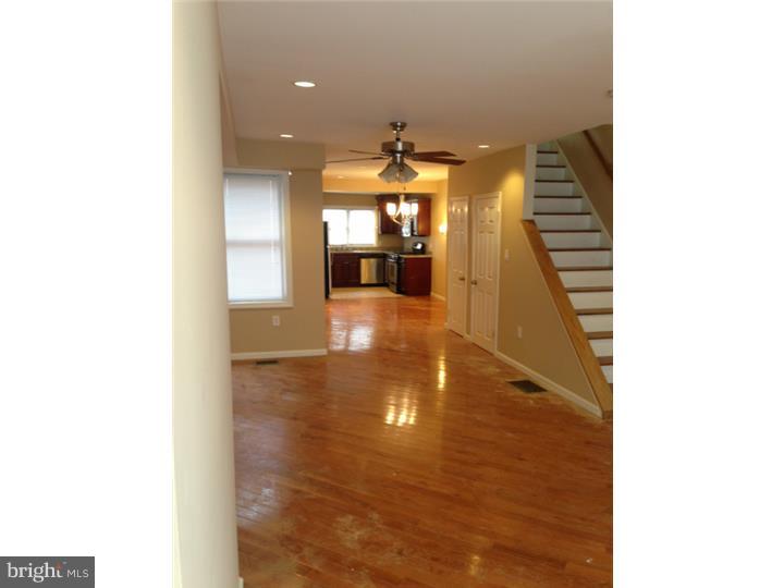 Huge 3 bedroom 2 full bath fully renovated home in 19125. East to share with room mates with 2 large bedrooms on the 2nd floor with a large shared bath, laundry in the 2nd floor hall and the 3rd floor is a private suite with full bath. The first floor is huge with a large living room, big kitchen and dining area. All appliances and fixtures included. Basement for storage. Hardwood through out the 1st floor and all halls. Carpet in bedrooms, tile granite, and ready September 7th. Central air gas forced hot air heat. Yard in rear.