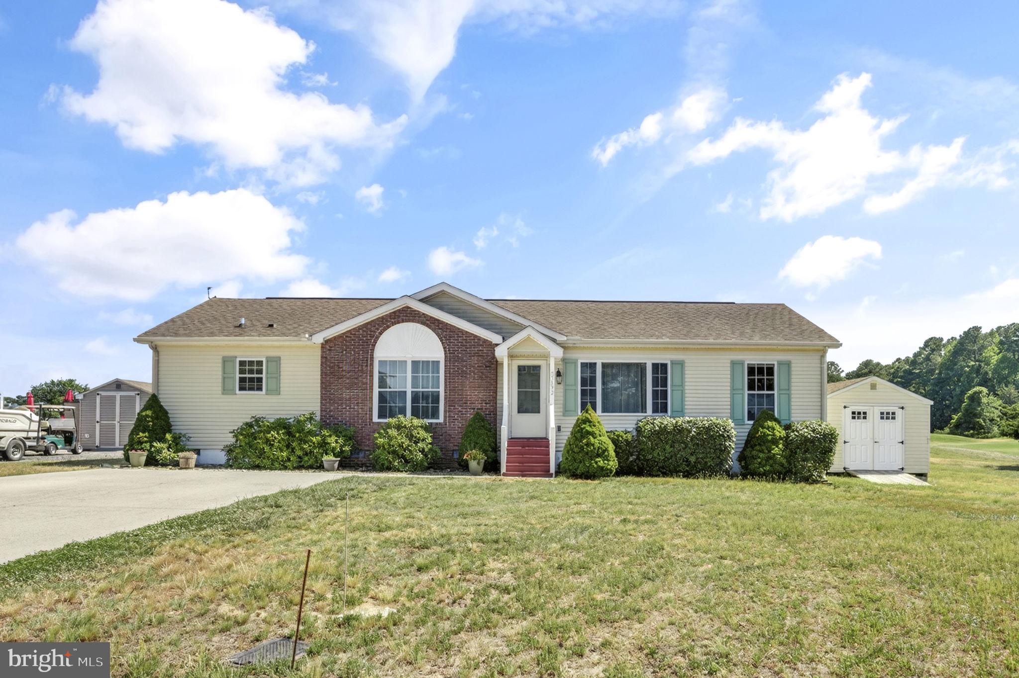 Welcome to this inviting ranch-style home nestled at the end of a quiet cul-de-sac in the sought-after Captain's Cove Golf & Yacht Club community. Backing to the golf course, this property offers spacious living areas, a peaceful setting, and the relaxed coastal lifestyle that makes Virginia's Eastern Shore so desirable.

As you arrive, you'll appreciate the attractive brick-accented façade, paved driveway, and welcoming curb appeal. Step inside and you'll immediately notice the bright, open layout. The spacious living room provides a comfortable place to gather with family and friends and flows effortlessly into the dining area, creating an ideal space for both everyday living and entertaining.

The large kitchen offers abundant cabinetry, generous counter space, a breakfast bar for casual meals, and excellent sightlines into the adjoining family room. The adjoining family room is filled with natural light and offers a comfortable space to relax, gather, or entertain. Sliding glass doors lead to the rear deck, creating an easy connection between indoor and outdoor living.

Step outside and enjoy the peaceful backyard setting. The rear deck provides the perfect place for morning coffee, outdoor dining, or unwinding after a day at the beach or on the golf course. Backing to the golf course, the property enjoys a sense of openness and a scenic backdrop of fairways and mature trees beyond. The cul-de-sac location adds to the property's appeal and relaxed atmosphere.

The thoughtfully designed floor plan places the private primary suite on one side of the home, complete with a walk-in closet and en-suite bath. Two additional bedrooms and a second full bath provide comfortable accommodations for family and guests. A dedicated laundry room adds convenience and additional storage space.

Outside, a detached storage building provides room for tools, lawn equipment, beach gear, golf clubs, and more.

Life in Captain's Cove offers an exceptional collection of amenities, including a waterfront marina, indoor and outdoor pools, fitness center, golf course, pickleball courts, playgrounds, basketball courts, boat launch, fishing, walking paths, and an on-site restaurant overlooking Chincoteague Bay.

Located just minutes from Chincoteague Island, Assateague National Seashore, beaches, boating, dining, and shopping, this home offers the perfect blend of coastal recreation, small-town charm, and resort-style amenities. Whether you're searching for a primary residence, vacation getaway, or investment opportunity, this Eastern Shore property is ready to help you enjoy everything the area has to offer.