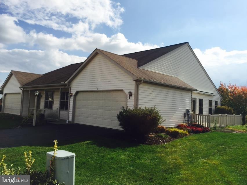 New carpet, fresh paint, new dishwasher & refrigerator are just some of the highlights of this lovely 2 bedroom home that offers single story living at its finest. 2 car garage and patio with retractable awning. This home will not last long!