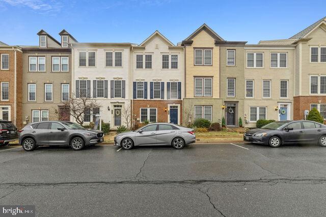 Wonderful Townhome w/ the size of a Single Family! Great 4BR, 3.5 Bath with 2 Car Detached Garage in Sought After Oaklawn-Gourmet Kitchen with Granite Counters, Breakfast Bar & Breakfast Area- Gas Fireplace-Gleaming Hardwood Floors on Main Level-Spacious Master Bedroom with Walk in Closet & Luxury Bath-Nice Rec Room.   Deck and Patio.  Super private backyard that leads to a detached 2 car garage.   Area above garage is semi-finished with flooring.  Very convenient to historic downtown Leesburg, Village of Leesburg (Wegemans) as well as main commutuer routes... Greenway Toll Road and Rt 7.