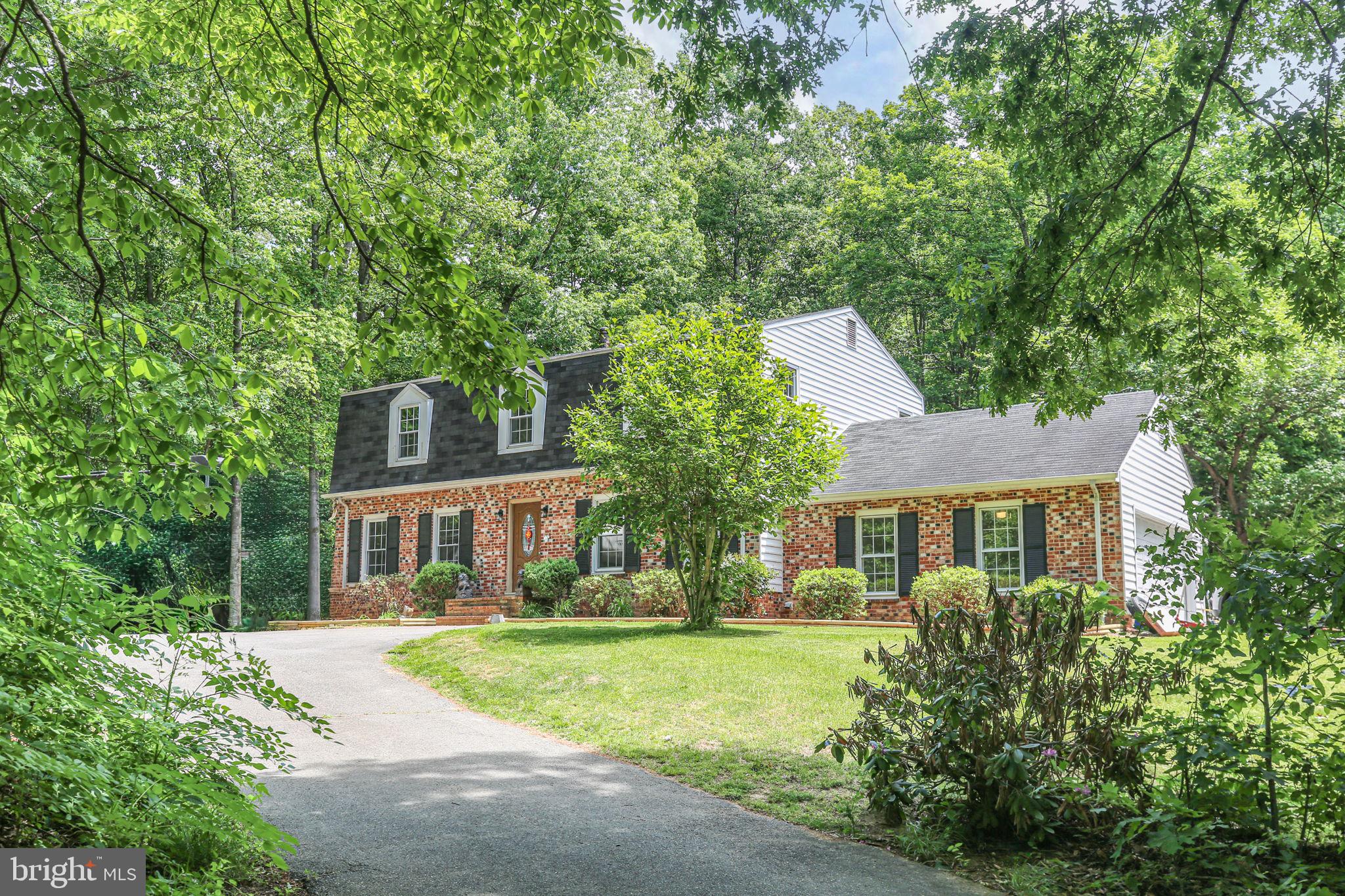 Your very own PRIVATE OASIS! Tucked away on 5.34 private acres with NO HOA! This exceptional property offers the perfect blend of peaceful seclusion and unbeatable convenience. Ideally located just minutes to the VRE, MAJOR shopping, Highways, and Military facilities, you’ll enjoy easy commuting while coming home to your own PRIVATE OASIS. Inside, the home features updated LVP flooring throughout, built-in bookcases, and a versatile enclosed porch!  BOASTING a perfect MEDIA room and plenty of space to store your RV, Boats, Trailers, and all your outdoor toys! NEW WINDOWS and HVAC re sure to please! This property offers endless possibilities for recreation, hobbies, or future expansion. Rare PRIVACY, and LOCATION all in one incredible property! DON"T MISS OUT!