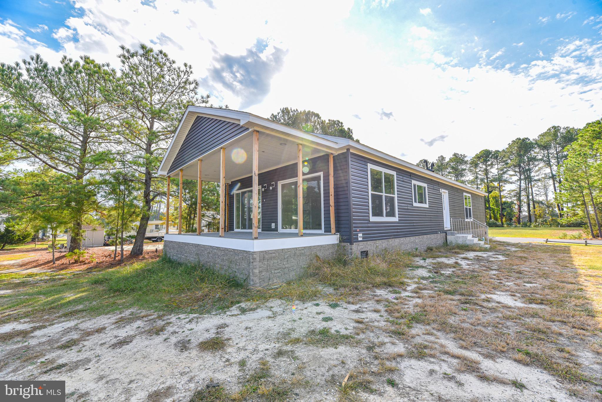 This 4 bedroom/ 3 bath new construction home features a covered front porch, overlooking the marina and a kitchen featuring a large island with sink, hi rise spring faucet and pendant lighting.

The lot can accommodate a 24' x 24' garage that is not included in the price. Speak with one of our sales consultants to discuss pricing for the garage and any additional features you would like to make this home yours!

Coveside is a delight for those who love to boat and fish and features easy access to the Rehoboth Bay! Playgrounds, tennis courts, and beautiful waterfront areas are just moments from your doorstep in the Pot-Nets Coveside community. Enjoy a unique combination of seclusion and convenience at your new home in Coveside. Come see your new home today!

*This is a spec home that has recently been set, and is under construction. Please be mindful of this when viewing.