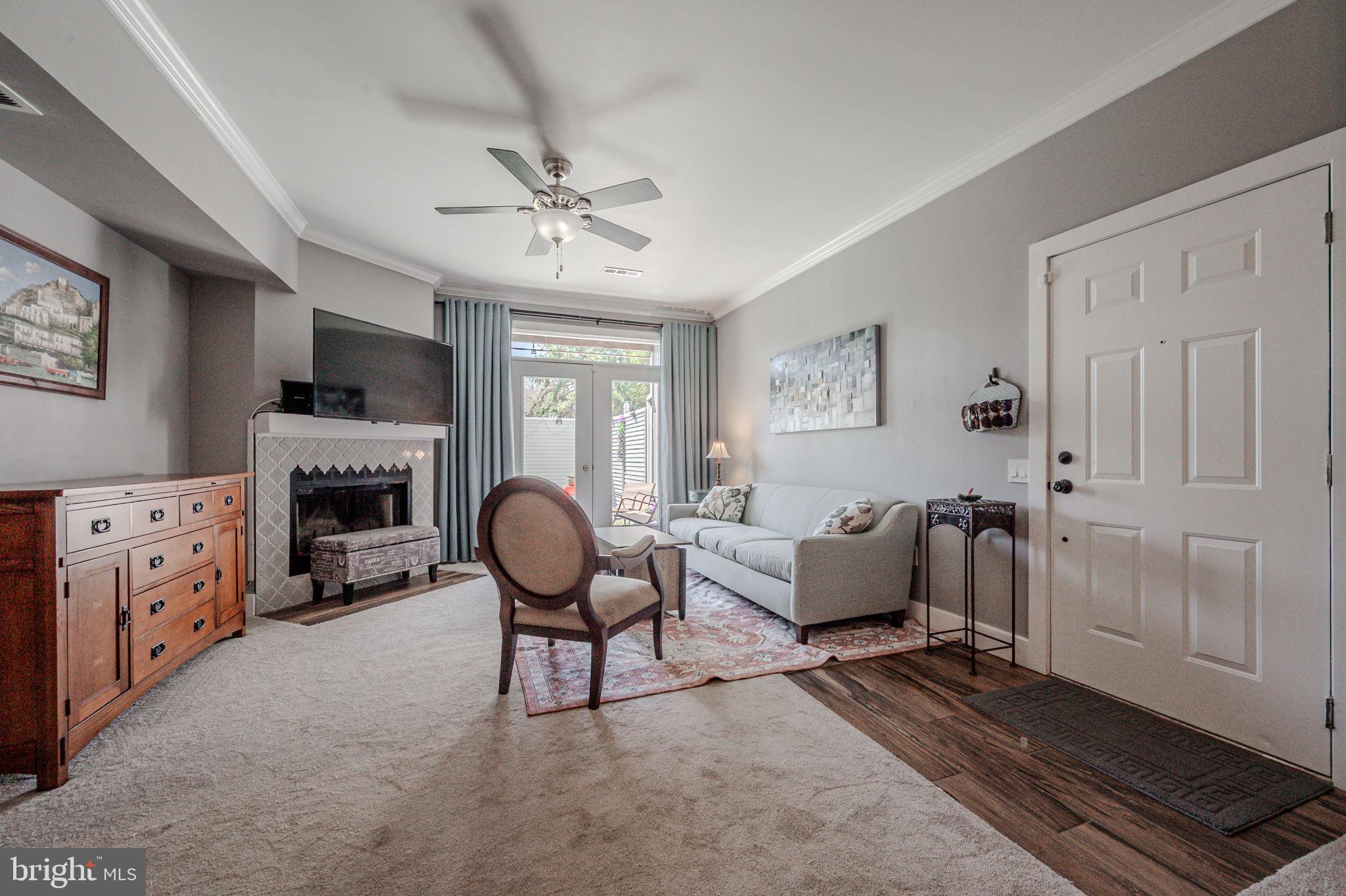 Welcome home to your new condo in Waters Edge! This immaculate condo is well maintained, tastefully updated, and features a super rare private yard perfect for your own gardening oasis! This community is located within minutes of major highways like I-95 and 896 making it super convenient for commuting, shopping, dining, the University of Delaware, and the entertainment that Newark has to offer. Amenities to the community include a club house with a fitness center, an outdoor community pool, walking paths, and a dog walking area all surrounded by water views! This unit is located on the first floor and has a covered hallway for convenience. Entering the unit onto the tile floored entrance, you will notice the open spacious living and dining rooms, the coziness, and the neutral paint colors that will match anyone’s style. The living room features a fireplace as a focal point and ample natural light coming through the sliding glass door that leads to the private yard. This yard is set up perfectly for a gardener, someone with a pet, or just anyone who enjoys their own private outdoor space! The kitchen is well updated with stainless steel appliances, tiled flooring, gas cooking, and tastefully painted cabinets with a matching countertop. There is also an opening through the kitchen into the dining area with bar height countertops perfect for everyday living. The large main bedroom features built in closet and drawer space on the way to the private full bathroom. This stylish bathroom comes with a tiled floor, updated shower stall with easy access and glass doors, and an updated white vanity with matching fixtures. There is another bedroom with a spacious closet and another beautifully done hallway bathroom. Completing the interior, there is a laundry room with well thought through shelving for storage. Additional features include an updated HVAC system and a new water heater. Shopping for a condo means shopping for convenience and easy living. This unit and community check those boxes all with an affordable condo fee. From the décor down to the trim and cleanliness, you will feel the pride of ownership. With the long list of amenities and upgrades this is a fantastic opportunity to drop your bags and call 2602 Waters Edge home. Schedule your private showing today!