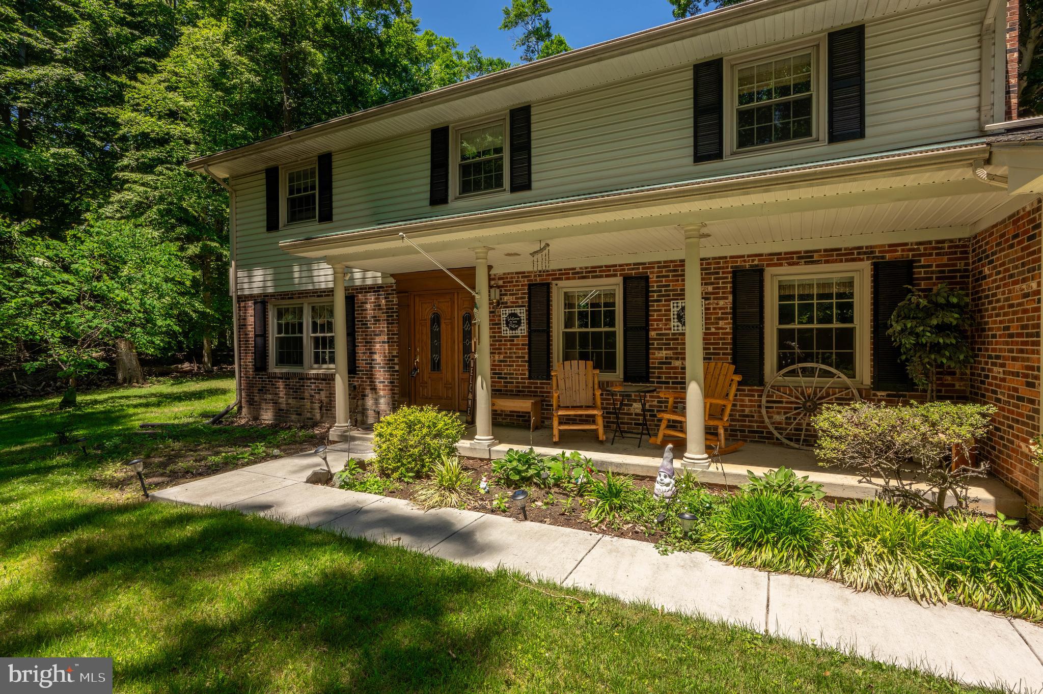Gorgeous Four-Bedroom Three full Baths with Private setting at the end of the road, Long Driveway with Carport Covered Front Porch Two Car Over Sized Garage, Ample Parking Sitting on .75 Acres of land Living here is like having your own Little Osias, Updates Galore Gleaming Hardwood Floors Throughout, Large Eat in  Kitchen with Counter seating on each side tons of Cabinets, Separate Dining room  Great Lighting  Cozy Family room,  Livingroom with Fireplace Recess lighting, Main Bedroom is Large with Walk in Closet and Bathroom, The other Three Bedrooms are very nice size with Harwood Floors, Basement is Waterproof and has tons of storage and can easily be Finished.
 This home will not last