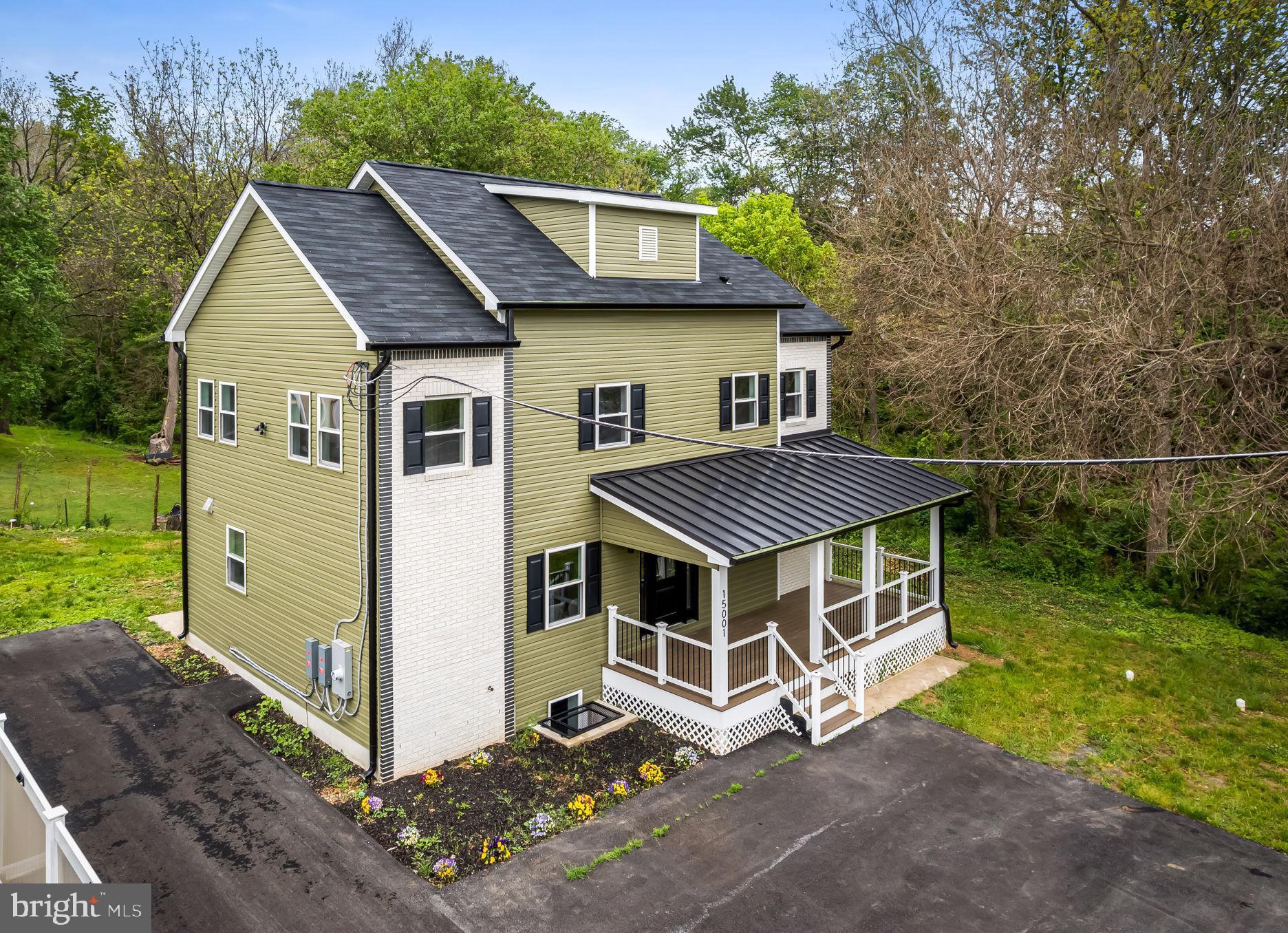 Welcome to 15001 Darnestown Rd, this beautifully renovated home is designed with both style and functionality in mind. From the moment you arrive, you’ll notice the attention to detail from the inviting oversized front porch to the thoughtfully curated finishes throughout the home.

Inside, you’re welcomed by a bright, airy, open-concept layout that seamlessly connects the kitchen, dining, and living spaces, creating the perfect setting for entertaining or everyday living. The stunning kitchen features sleek cabinetry, high-end finishes, a farmhouse sink, stainless steel appliances, an oversized pantry, and an impressive design sure to be the heart of the home. The living room offers a cozy electric fireplace, adding warmth and character to the space. Making this space feel welcoming. 

The main level also includes a versatile bonus room ideal for a home office, guest suite, playroom, or a space to fit your lifestyle needs. Upstairs, you’ll find three spacious bedrooms, two beautifully updated full bathrooms, and a convenient full laundry room. The luxurious primary suite feels like a private spa retreat, complete with a dual vanity, soaking tub, and a beautifully designed walk-in shower.

The fully finished basement provides endless possibilities with additional living space perfect for a media room, home gym, office, guest quarters, or additional bedrooms. Step outside to your private backyard, ideal for relaxing evenings, entertaining guests, or simply enjoying peaceful everyday living.

Perfectly located with easy access to major highways, interstates, nearby shopping, and dining, this home offers the ideal balance of convenience and privacy. Schedule your private tour today before this exceptional home is gone!