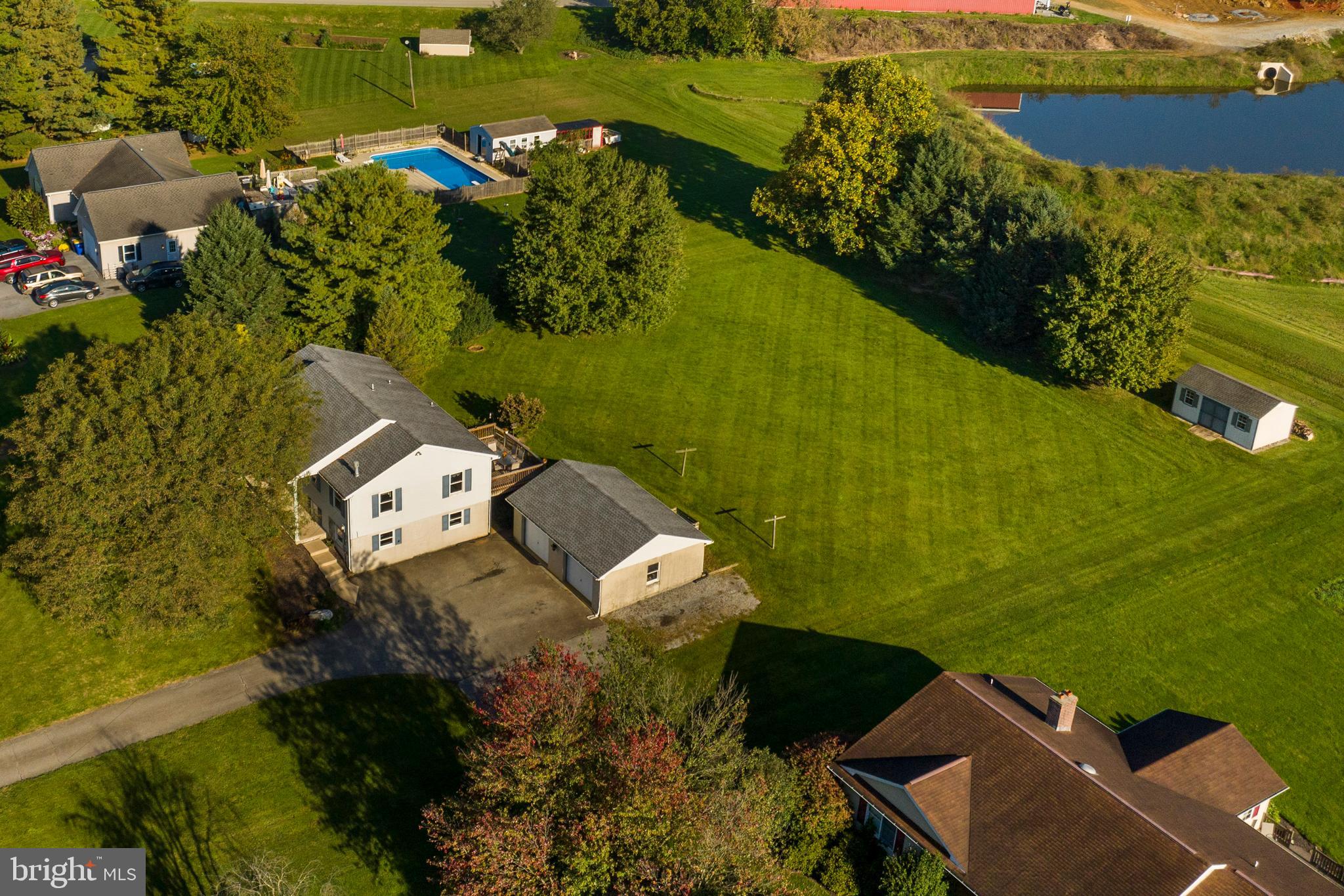 AUCTION DATE - SATURDAY, DECEMBER 9, 2023 10 A.M. LISTED PRICE IS AN OPENING BID ONLY AND IS NOT INDICATIVE OF THE FINAL SALE PRICE. REAL ESTATE: Custom split foyer house w/2726 SF finished area, eat-in kitchen w/custom oak cabinets, breakfast nook & appliances, formal dining room w/French doors to rear deck 18x12, living room w/free standing propane stove, 5 bedrooms, 2 full baths, laundry w/washer & dryer included, large family/rec. room w/outside entrance, electric baseboard heat, central AC & covered porch. Recent Upgrades include insulated windows, electric hot water heater, reverse osmosis & roof on house & garage new in 2016. Outbuildings: Detached masonry block 2 car garage 28x21 w/electric & utility shed 20x12 all on level 1 ACRE country lot w/mature shade, large rear yard area, paved driveway & parking, on-site well & septic. NOTE: Ideally located custom split foyer house w/spacious rooms & finished basement is in move-in condition. Convenient location, minutes to Intercourse & Gap. Easy access to Rt. 340, 30 & 41. Terms 10% down, balance 60 days or before.