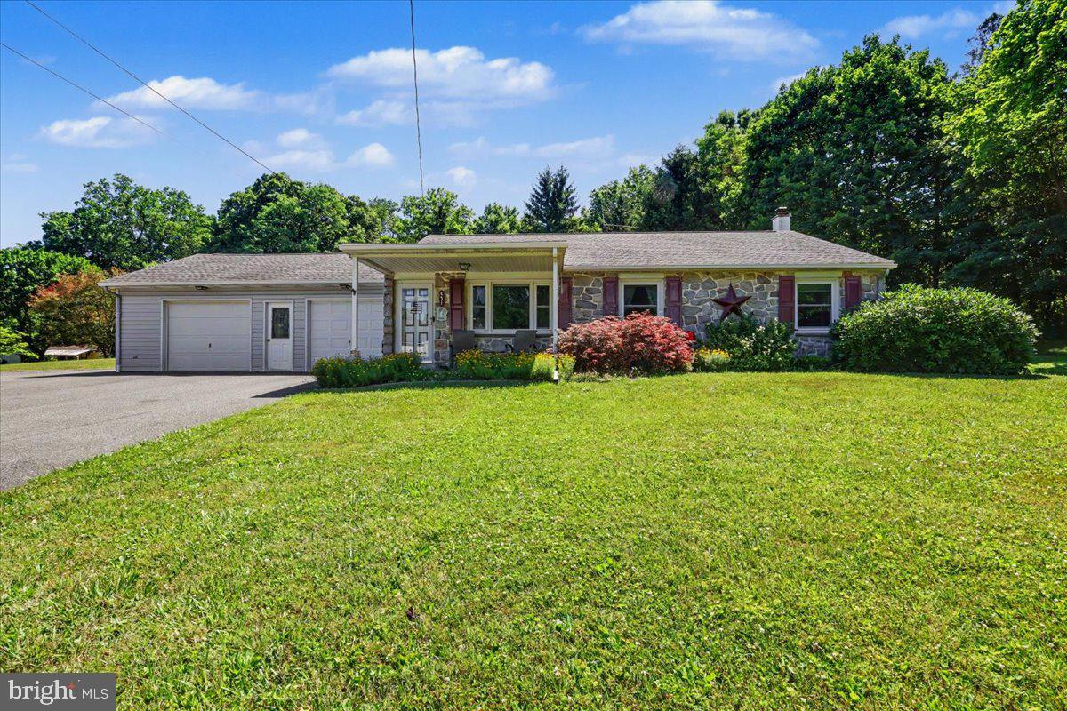 Welcome home to easy one-floor living!  This well-maintained stone-front ranch offers wonderful curb appeal and is set on a beautiful nearly one acre lot featuring an inviting in-ground pool-perfect for summer enjoyment and entertaining.  Inside, you'll find 3 bedrooms, an eat-in kitchen with Corian Countertops and breakfast bar, a dining room, and a comfortable living room with abundant natural light. Start your mornings with coffee on the covered rear patio while overlooking the scenic backyard.  The finished basement provides additional living space and features a pellet stove with thermostat for added comfort and efficiency.  The gas powdered generator offers peace of mind year-round. Home is equipped with all house vacume. This is a fantastic opportunity to enjoy comfortable living both inside and out!  Professional Exterior Photos coming soon