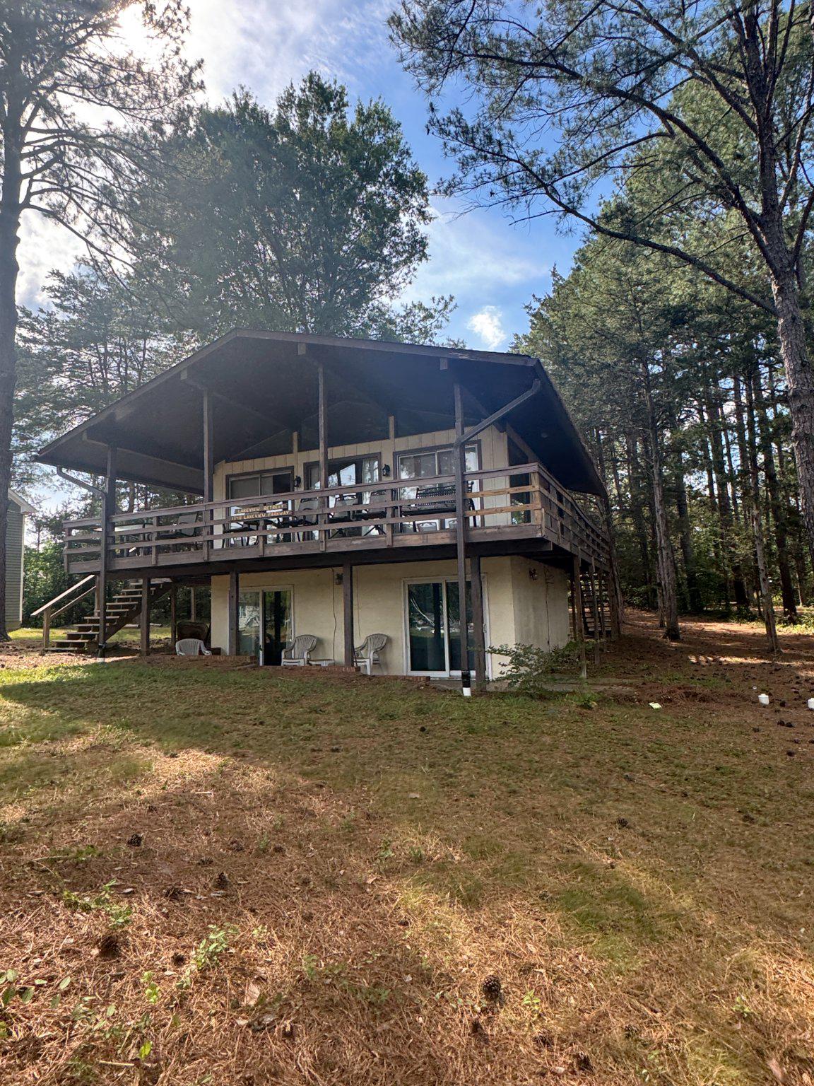 Enjoy the lake views from this charming 3-bedroom, 1.5-bathroom raised ranch in the desirable Lake of the Woods community offers a unique investment opportunity. Built in 1972, this property spans 1,152 sq. ft. and is situated on a spacious 0.3-acre lot, providing ample outdoor space for potential enhancements or expansions. The home features essential appliances including a electric oven/range, refrigerator, and washer/dryer, making it move-in ready or an attractive rental option. The average condition of the property allows for value-add renovations, which can significantly increase rental income or resale value. Enjoy stunning water views just 50 feet from the Lake of the Woods, a prime location for water enthusiasts. The community offers extensive amenities such as a beach, boat ramp, marina, and outdoor pool, enhancing the property's appeal to potential renters or buyers. With 24-hour security and gated access, residents can enjoy peace of mind. Investors will appreciate the potential for high returns in this sought-after area, where water access features include boating, fishing, and swimming. The community's golf course membership and recreational facilities further enhance its desirability, ensuring a steady demand for rentals or future sales. This property is not just a home; it's a strategic investment in a vibrant community with abundant recreational opportunities.