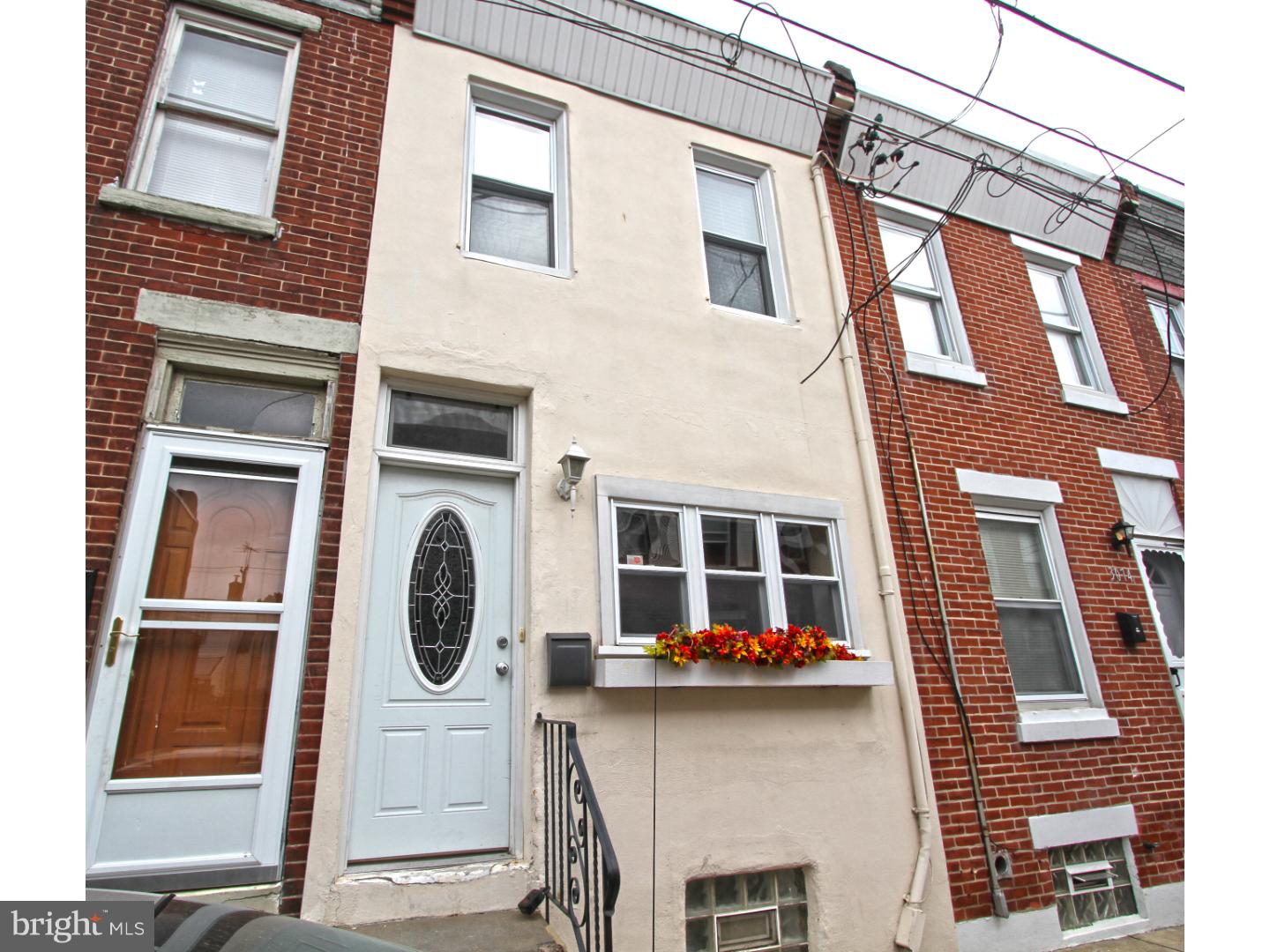 This charming completely updated 2 bedroom, 1 1/2 bath, with finished basement and great rear yard is a must see! Enter in to an open living and dining room and open kitchen area with breakfast bar that includes seating for two. Modern open staircase that leads to the full finished basement complete with new wall to wall carpet, freshly painted, a new powder room, and a large laundry area with side by side washer and dryer. We love this bonus space! Let's talk about the modern kitchen with solid wood cabinetry, stainless appliances including a gas range, polished granite counters, ceiling fan, some recessed lights, and access to a rear yard. The yard is cemented and fenced in for privacy and there is plenty of room for furnishings and a grill. Located right outside the kitchen makes for easy grill to table serving this summer. The 2nd floor has 2 spacious bedrooms filled with natural light, and ample closet space. The hall bath is a great size with a storage vanity and bath and shower combination. Central air and forced hot air heat, freshly painted throughout, and in move in condition. We welcome your visit.