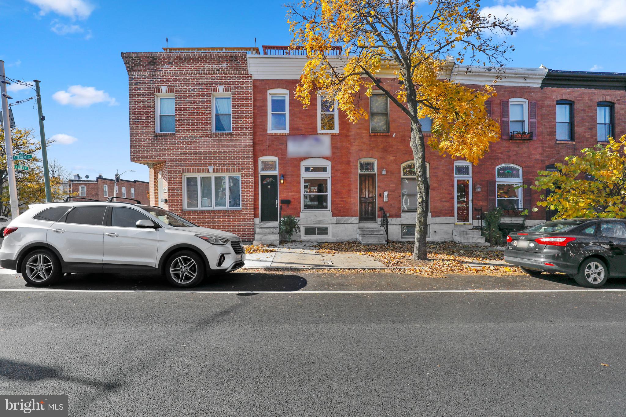 STUNNING 13+ FT WIDE ROW-HOME LOCATED ON SOUGHT AFTER BLOCK IN CANTON. GLISTENING HARDWOODS CASCADE THROUGHOUT. ENJOY CUSTOM CABINETRY, CROWN MOLDING, IMPORTED TILE, GORGEOUS GRANITE COUNTERTOPS, SS APPLIANCES IN DESIGNER CHEF'S KITCHEN. TONS OF NATURAL LIGHT. EXPOSED BRICK. FINISHED LOWER LEVEL. HIGH CEILINGS. TONS OF STORAGE. WALK-IN SHOWERS. WALK-IN CLOSETS. SPACIOUS 3 BEDROOMS WITH 2 FULL BATHROOMS. EXPANSIVE ROOF DECK FOR ENTERTAINING WITH AMAZING CITY AND PARK VIEWS. OVERSIZED OFF-STREET PARKING PAD WITH EASY ACCESS. CLOSE PROXIMITY TO RETAIL SHOPPING, LOCAL DINING, PATTERSON PARK, AND ALL MAJOR HIGHWAYS. SELLER WILL MAKE NO REPAIRS TO DECK. SCHEDULE A PRIVATE TOUR TODAY!