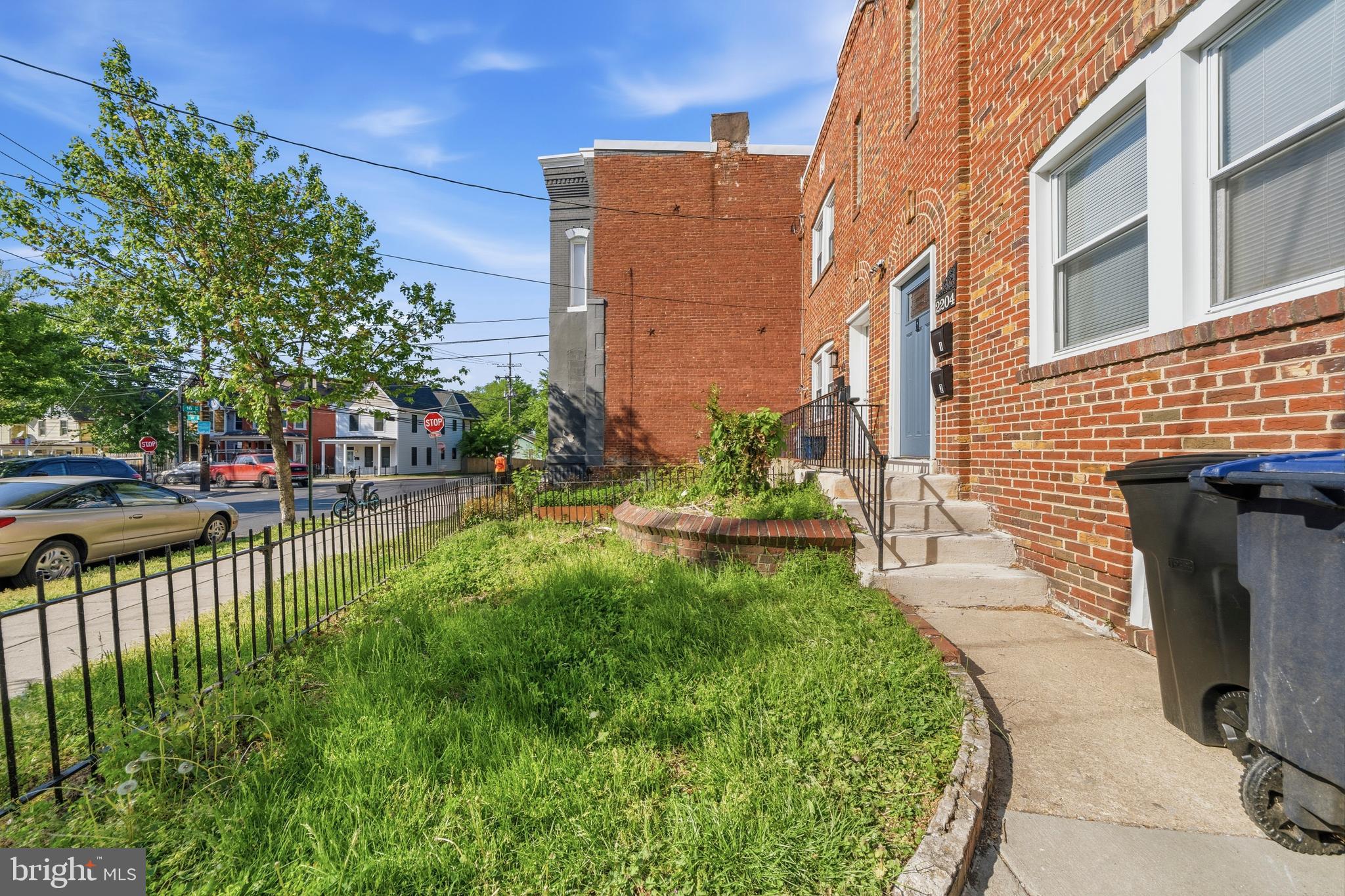 Brick 2BR/1BA rowhome in Randle Heights with 1,520 finished sq ft, central A/C, natural gas heat, public water/sewer, and a fully finished basement. Being marketed as a duplex/SFH option.
