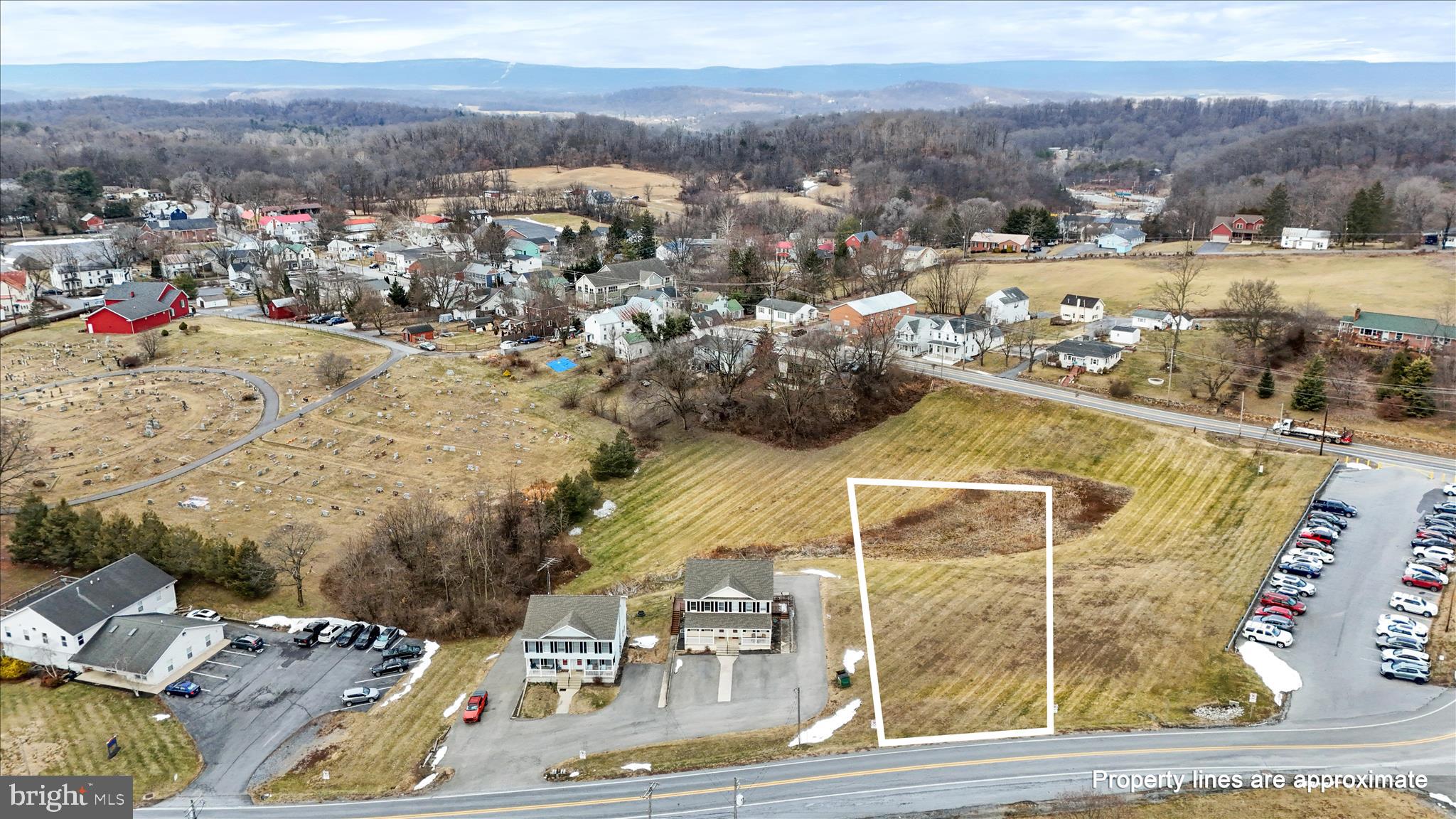 Highest and best use is one single family home, or one duplex. Public water and public sewer are available. 
The property has substantial frontage on School House Dr. Ideal commuter location within just a few short miles to I-81, the MD and VA state lines, and close proximity to Washington DC. This is a fantastic opportunity for investors and builders! Bundle with lots 4 & 5.