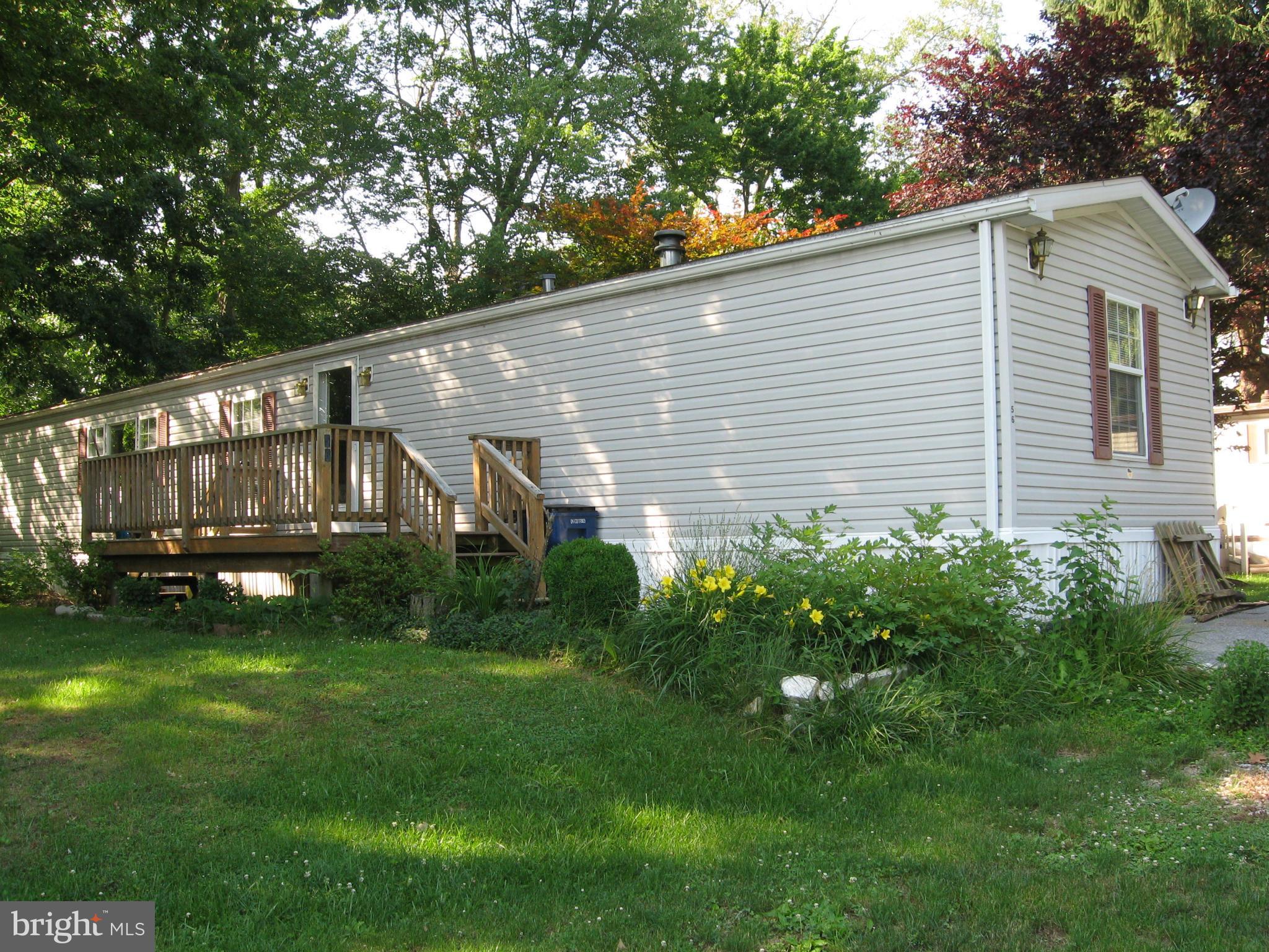 You will love the size of this 3 BR 2 bath mobile home & its many amenities. Cathedral ceilings, upgraded cabinetry, many options and upgrades thru out. All appliances included + 1 year home warranty. Level lot with woods in rear.  Fish pond and flower beds. Ground rent is currently $548 and includes water,sewer,taxes,snow removal and trash collection.  Buyer must be approved by park manager.