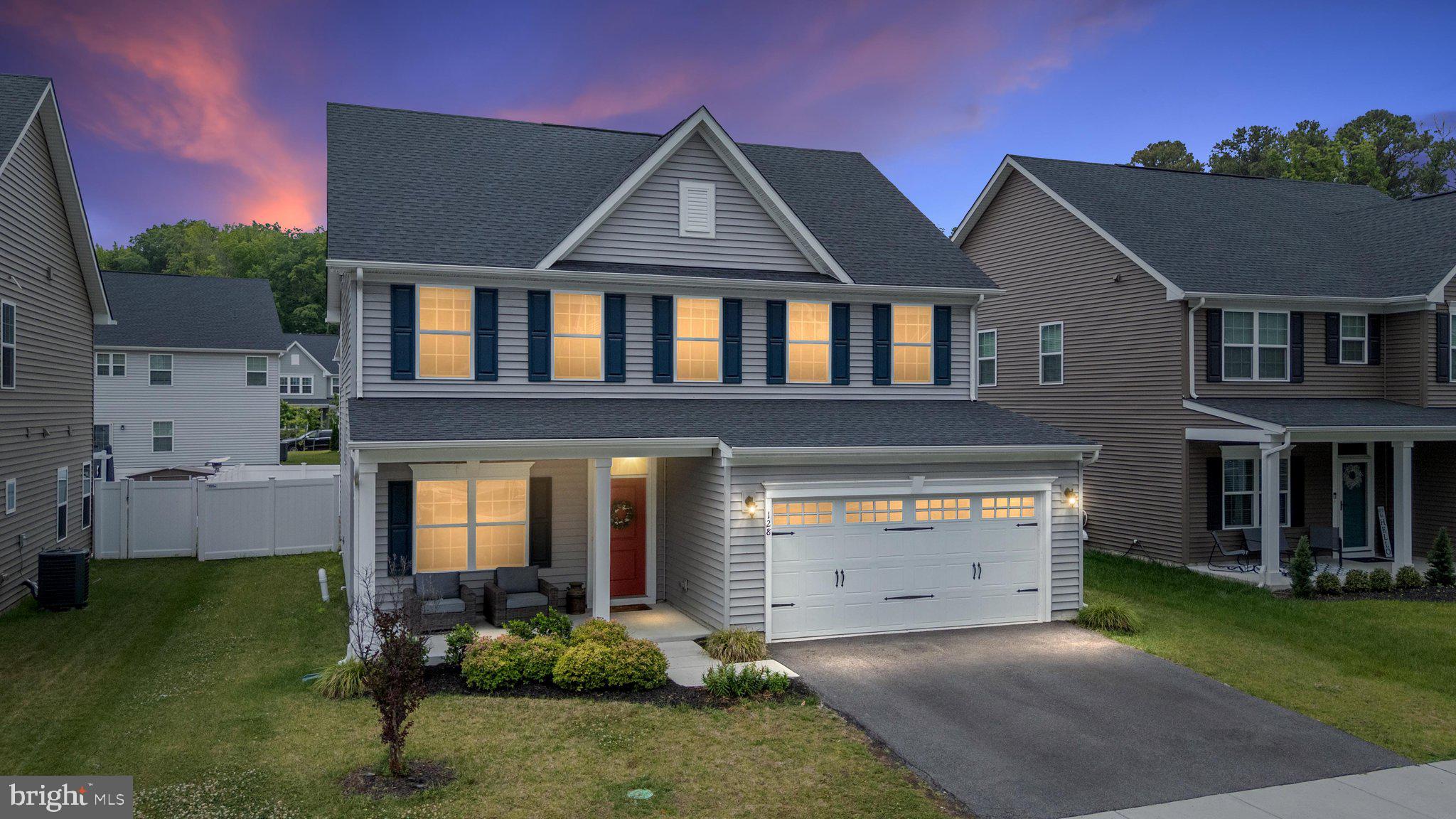 Why wait for new construction when this barely lived-in home in the desirable community of Perry’s Retreat is available now? Welcome to 128 Perry’s Retreat Boulevard, offering a bright, open-concept main level with LVP flooring throughout and a layout designed for everyday living and easy entertaining. The spacious kitchen features an oversized island, stainless steel appliances, pantry, quartz countertops, soft-close cabinetry, and plenty of room to gather. The main level also includes a convenient half bathroom, office space, garage access, an oversized coat closet, and a walkout to the spacious backyard. Upstairs, you’ll find four carpeted bedrooms, two full bathrooms, and a conveniently located laundry area. The beautiful primary suite features a tray ceiling, spacious walk-in closet with natural light, and an upgraded en-suite bathroom with LVP flooring, a dual vanity, and a shower with built-in seating and dual showerheads. Outside, enjoy a covered front porch with space for seating, a spacious backyard, and a maintenance-free vinyl privacy fence. Perry’s Retreat offers sidewalks throughout the community, playgrounds, and additional parking for boats, RVs, and extra vehicles. The location is another major bonus, with quick access to Route 50 and close proximity to Kent Island, the Narrows, Annapolis, Easton, St. Michaels, local dining, shopping, golf, boat launches, and Chesapeake Bay favorites. This move-in ready home offers the benefits of newer construction, a convenient Eastern Shore location, and no wait!