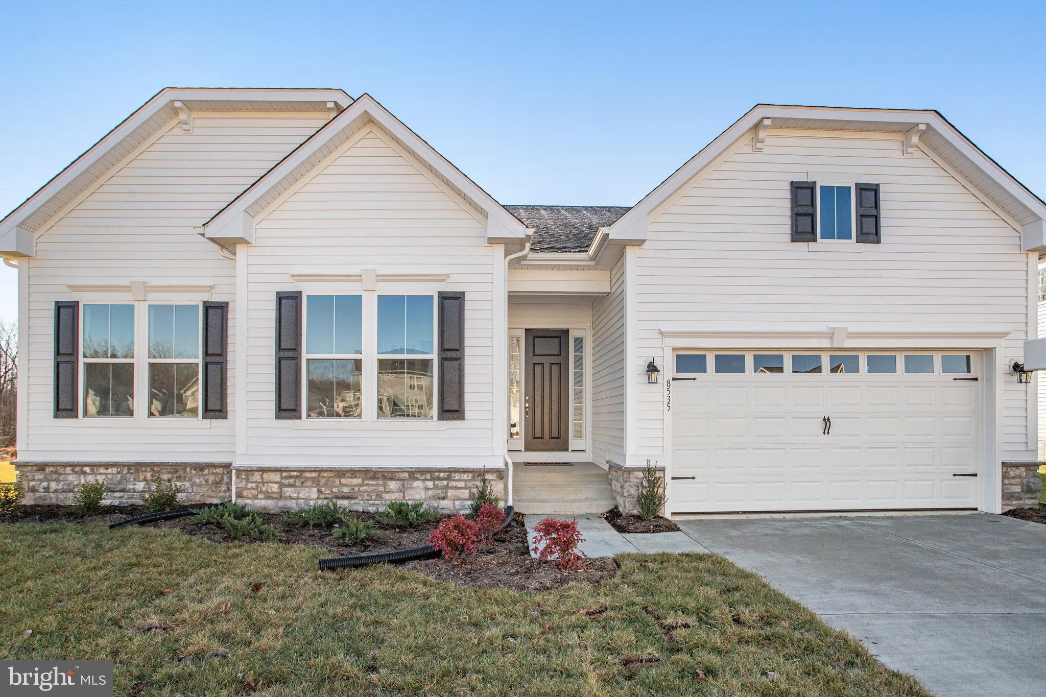 Experience the best of single level living with this gorgeous Daniel home. Step in and immediately be wowed by the 10' ceilings. The kitchen is the heart of the home and that is certainly true here, centrally located between the spacious great room and sunroom it is the perfect space to gather with friends and family. The large island provides an excellent focal point, or you can relax in the sunroom and enjoy the privacy offered by this lot backing trees to trees. If you prefer to be outdoors you will love lounging on included covered patio. The relaxing primary suite offers an immense walk-in closet, separated away from the addition two bedrooms for privacy. This home features 3 bedrooms, 2 full baths, and a half bath all on the main level, with a finished rec room and bathroom in the basement with room to grow in the basement, while still having ample storage space for all your needs.