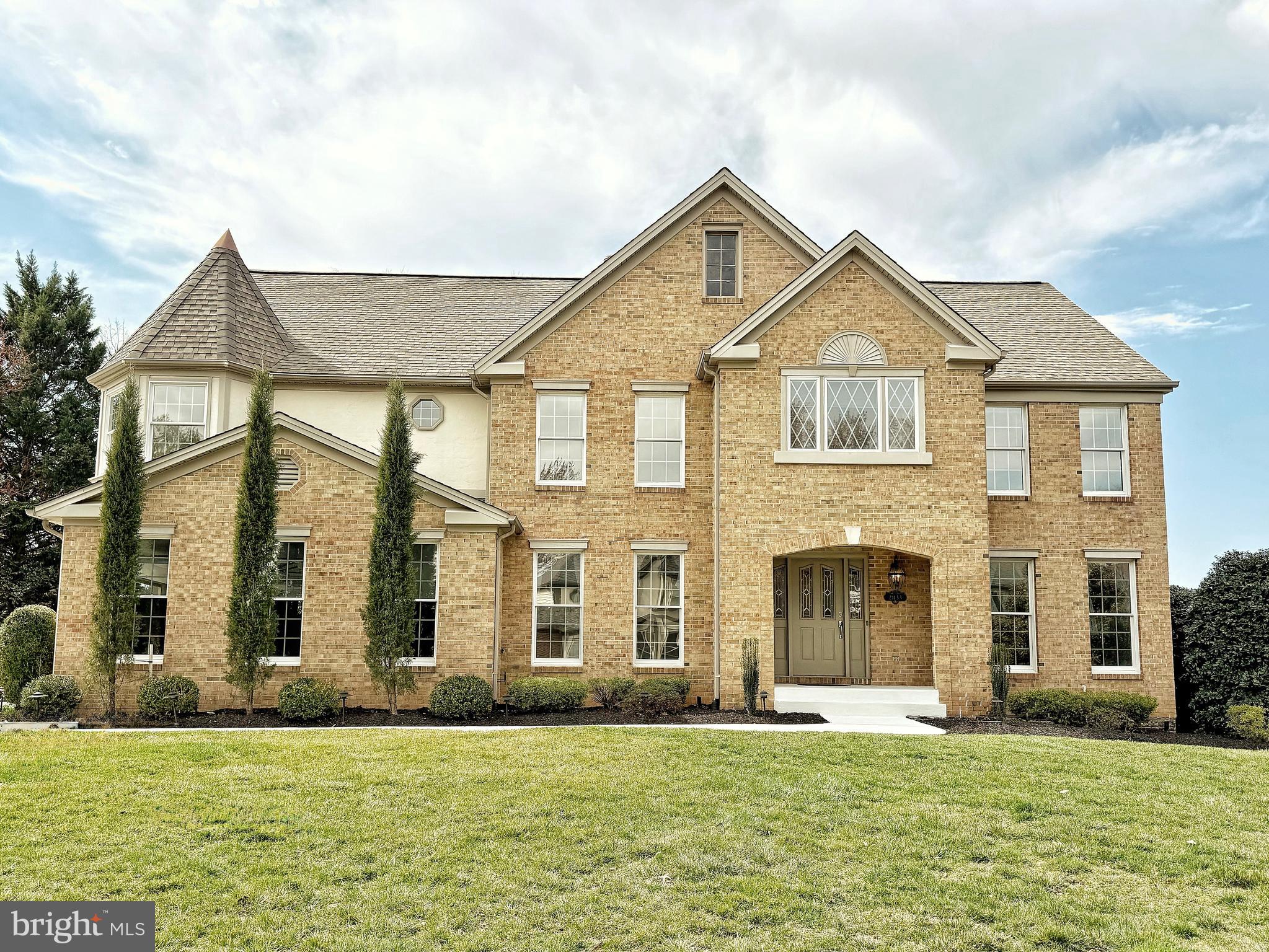 - Home Under Contract. Open House Cancelled. -
Stunning French Colonial in Prime Location
Located in one of the most desirable neighborhoods in Ashburn, this exceptional home boasts over 5,100 finished square feet of luxury living space. The oversized 2-car side-load garage adds convenience, while the expansive layout is perfect for both relaxation and entertainment.

Main Level Features:
-Newly installed LVP flooring throughout, including the stairs
-Open-concept kitchen with an eat-in space and butler's pantry
-Private office with built-in bookshelves for a cozy, productive space
-Gas fireplace and vaulted ceilings creating a warm, inviting atmosphere
-Stunning foyer creates the perfect first impression for guests

Renovated Basement:
-Complete renovation with premium tile floors throughout
-Bedroom with attached full bath
-Recreation room perfect for entertainment
-Additional washer/dryer hookups
-Kitchenette with breakfast bar
-Private entrance, making this basement feel like its own apartment

Upper Level Features:
-Four spacious bedrooms, each with an attached bathroom for ultimate privacy
-Fresh, new carpeting throughout the upper level
-Master bedroom with vaulted ceiling and walk-in closet with attached cedar closet
-Master bathroom complete with a luxurious jacuzzi tub for ultimate relaxation

Exterior Features:
-Extensive landscaping
-Fully fenced  backyard
-Two story deck with separate entrances to basement, family room, kitchen, & mudroom
-Premium corner lot nestled between two cul-de-sacs

With an exceptional layout, modern upgrades, and plenty of space for everyone, this stunning French Colonial is a true gem. Don’t miss the chance to call this beautiful house your home!