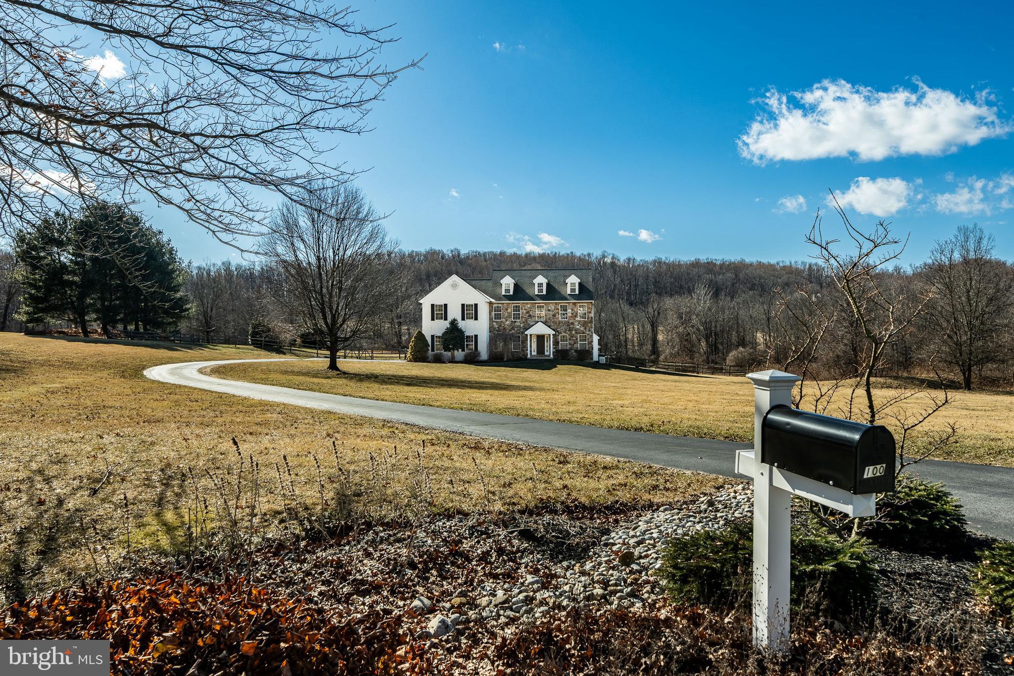 Welcome to 100 Rosepoint Road in Glenmoore! This 4-bedroom semi-custom home is a true Chester County beauty, offering a perfect blend of modern elegance, thoughtful upgrades, and serene countryside living. Nestled on 3.3 private acres in a quiet cul-de-sac, this home provides a peaceful retreat while still being conveniently located near major routes, shopping, and top-rated schools. From the moment you arrive, the home’s Genuine Pennsylvania Fieldstone facade and paver front walkway create an inviting first impression. The backyard is an entertainer’s dream, featuring a Techo-Bloc patio with PA Bluestone steps, perfect for summer barbecues, al fresco dining, or simply unwinding in the tranquil surroundings. About one-acre of the yard is fenced. This offers plenty of space for pets, play or even a future inground pool. Additionally, a detached kennel with outdoor runs, heat, and electricity provides a fantastic setup for pet lovers, or it can be easily repurposed as a garden shed or workshop. The open pasture is level and ideal for gardening, outdoor games, or future expansion. Step inside to you’ll be delighted by the newly stained and refurbished hardwood floors (2025) that flow throughout the main living spaces. The two-story family room is the heart of the home, featuring a gas fireplace and a breathtaking wall of windows that flood the space with natural light while offering picturesque views of the backyard. The adjacent gourmet kitchen has been completely remodeled to meet the needs of even the most discerning chef. It boasts: A custom oversized island with seating, a Viking gas range with a Zephyr hood, stylish marble backsplash, Bosch dishwasher for quiet efficiency, Sharp drawer microwave for modern convenience. Off the kitchen, the laundry room includes a utility sink, washer/dryer hookup, and an exterior door for easy outdoor access. A built-in custom storage locker provides the perfect drop zone for coats, bookbags, and sports equipment—ideal for keeping everyday clutter at bay. The private office/den, located at the front of the home, offers a quiet space for work or relaxation. A formal dining room and a beautiful turn-style staircase complete the main level. The spacious primary suite feels like a personal retreat, featuring a vaulted ceiling, a cozy sitting area, double closets, and brand-new carpeting. The en-suite bathroom has been recently remodeled to create a spa-like experience, complete with a quartz double vanity, a soaking tub, and a separate glass-enclosed walk-in shower. Three additional bedrooms share a well-appointed center hall full bathroom, providing plenty of space for family and guests This home has been meticulously maintained by its original owners, who have made significant improvements over the years, including: Refurbished hardwood floors (2025), Remodeled gourmet kitchen (2024), Updated primary bedroom and en-suite bathroom (2024), Dual-fuel HVAC system with propane gas backup, Generac whole-house generator, Fenced yard with shed/kennel, Extensive paver hardscaping with a propane gas firepit and GAF extended transferable roof warranty. With its stunning design, modern upgrades, and endless possibilities, this home is ready to welcome its next owners. Schedule a showing today and experience the beauty and tranquility of 100 Rosepoint Road!