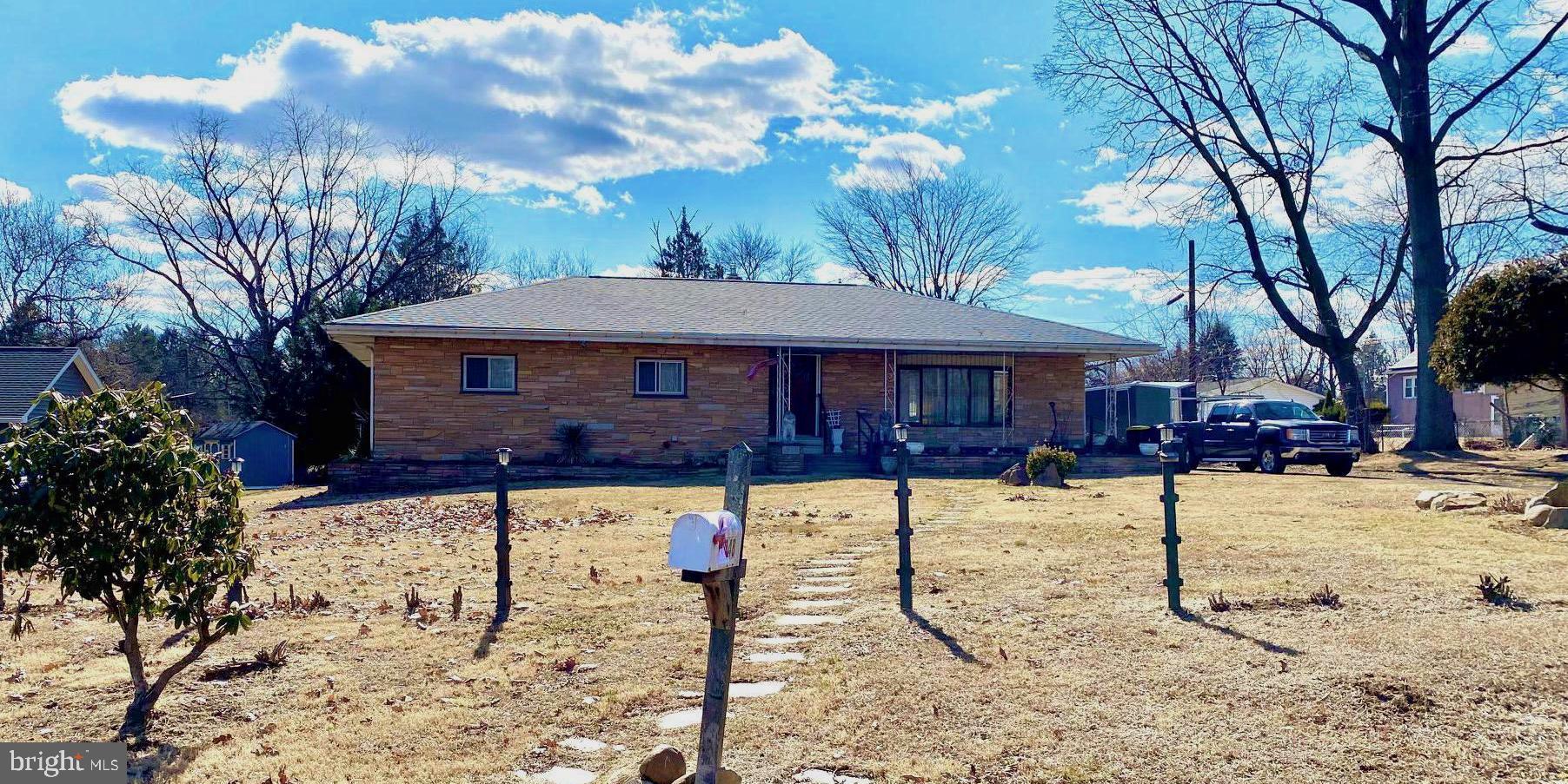 Here's your chance to own a one of a kind home in beautiful Glen Ashton Farms on 0.7 acres,  with 2800 square feet of living space. ( per owner)   Enter from the front  Covered porch into the main foyer.  The Main floor consist of 4 Bedrooms  with wood parquet floors ,Master Bath with Ceramic tile and Stall shower, a full Hall  Bath with Ceramic tile,   large Eat in Kitchen, Dining Room and Very Large living room . Some floors have wall to wall carpeting but have the Original  Wood Parquet floors underneath.
Stairs off the  kitchen lead to a fully finished basement that is the full length of the home. It features a  very  large Family room, additional kitchenette( no stove or refrigerator),  Laundry Room, Sewing/ Craft room, large Storage Closet and an  additional  large room.   Family room is carpeted but also has Original Wood Parquet floors.  This home is well taken care of by it's one owner, but is in need of some cosmetic updating.  However it has a New Roof (2024) new AC (2024) New Chimney Liner 2025.  All Bensalem Township Certifications have been done.  Heater Cert, Chimney Cert and Electrical Cert.
The outside features  a 6 car driveway, one car garage, with storage in the other one.  Did I mention the in-ground Pool  with slide?   Pool needs new liner. Has not been used for a few years.   There is also a pool changing room, additional shed, and back patio.  
Estate is being sold "As Is" and family will be doing no repairs.