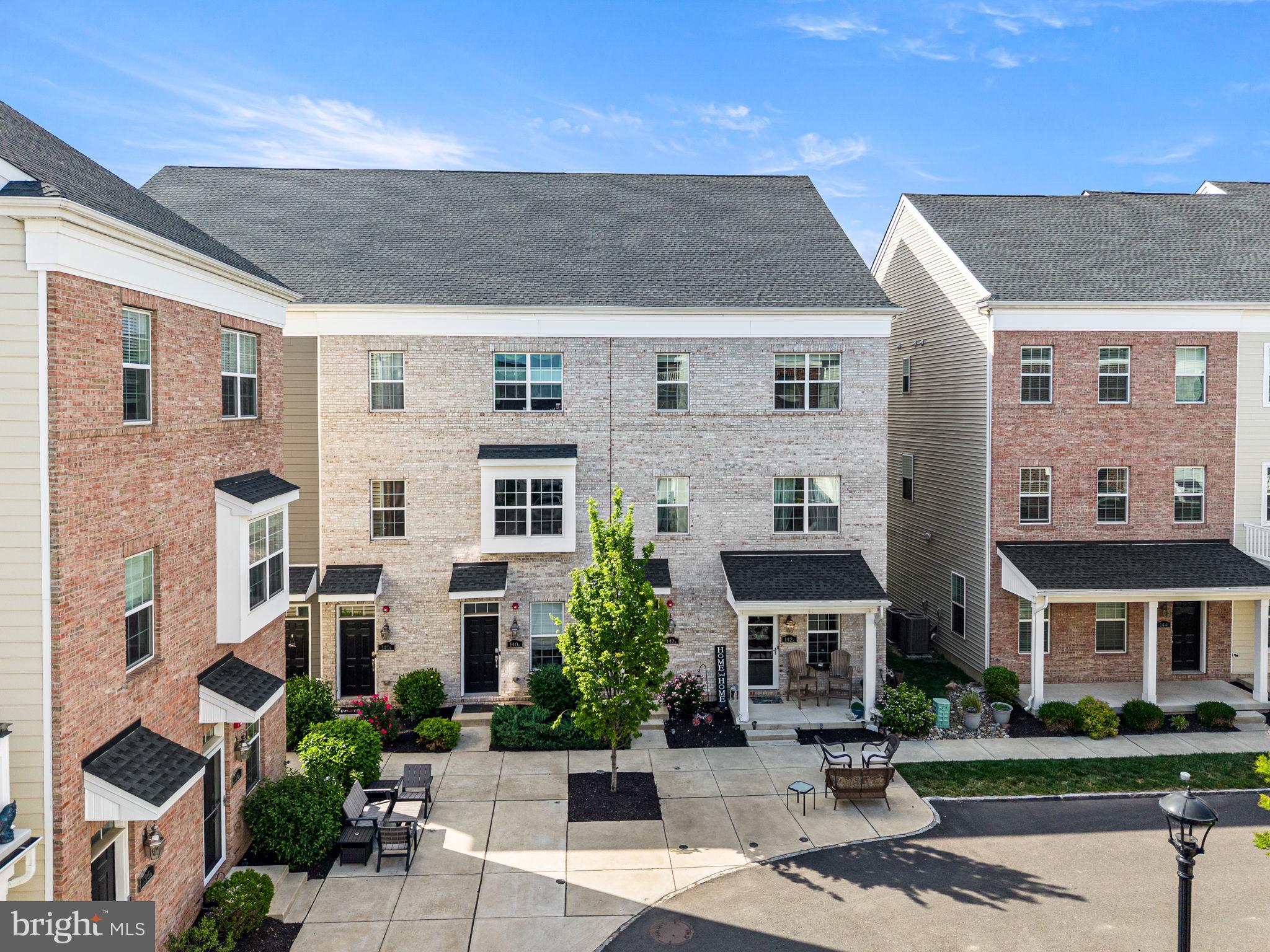 Welcome to Waterside, Bensalem’s premier riverfront community, where luxury, convenience, and low-maintenance living come together in this beautifully appointed 2-bedroom, 2.5-bath townhome offering over 2,150 square feet of living space and the rare convenience of a private elevator. From the moment you arrive, you'll appreciate the attractive white washed brick exterior and direct river views from your front entryway. Inside, the open-concept main living level is designed for both entertaining and everyday living, featuring a spacious living room, dining area, and an upgraded kitchen complete with granite countertops, stainless steel appliances, abundant cabinetry, a large peninsula with seating, and a built-in wine rack. Luxury vinyl flooring and recessed lighting flow throughout the main level, creating a warm and inviting atmosphere.  There is also a half bath, large closet, elevator access, and laundry room with additional refrigerator on this main level. The expansive primary suite offers a private retreat with two separate large walk-in closet sand a well-appointed en-suite bath. Upstairs, the oversized loft provides incredible flexibility as a second living area, home office, fitness space, media room, or potential guest accommodations. A generously sized second bedroom, and additional full bath complete this upper level.  Step outside to the private rooftop terrace and enjoy sweeping views while relaxing, entertaining, or taking in the sunset. Designed for accessibility and convenience, the private elevator makes navigating all floors effortless. Additional features include an attached garage, ample storage, and modern systems throughout. Located in the highly sought-after Waterside community, residents enjoy scenic walking trails, parks, riverfront access, and a vibrant neighborhood atmosphere, all just minutes from shopping, dining, 1-95, Philadelphia, and regional rail service. If you've been searching for low-maintenance living without sacrificing space, style, or functionality, this exceptional home checks every box. Schedule your private tour today.