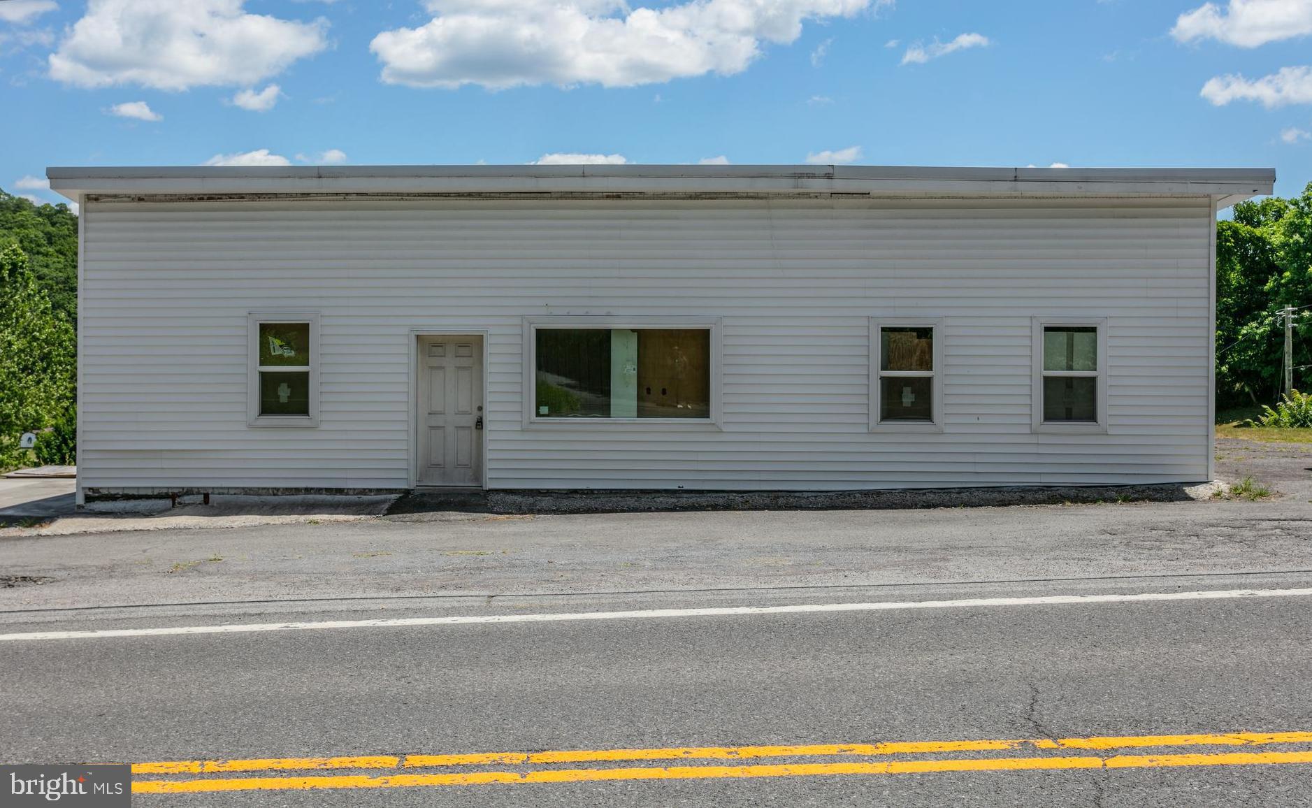 Opportunity to own a vast commercial space in a prime location, totaling 8,399 sq ft. Zoned B-1 for Neighborhood Commercial, this property offers the exibility to live in the building while running your business, or to transform it into your dream home. The possibilities are truly endless with this versatile space, making it an ideal choice for entrepreneurs, investors, or anyone looking to customize a property to their specific needs and vision. Whether you’re looking to launch a new business venture or create a unique personal residence, this property provides the canvas for your creativity to flourish.