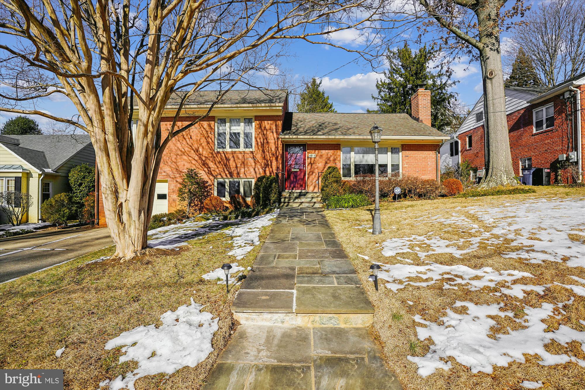 Welcome to this spacious split-level home located in the highly sought-after West Chevy Chase neighborhood. Enter into a large living room featuring a wood-burning fireplace and hardwood floors. This home includes a separate dining room that’s perfect for gatherings. The expanded gourmet kitchen, with its maple cabinets, is a dream for any cook and offers both a breakfast bar and a table space eating area. It also connects to a cozy reading nook with a built-in bookcase.
On the main level, there's a sun-room that can serve as a family room or office. The back of the house boasts cathedral ceilings and floor-to-ceiling windows, allowing you to enjoy views of the lush private garden. The primary suite has a sitting area and a luxurious bathroom with a jetted tub.
The garden is well-established, with a flagstone patio in the rear for outdoor seating. The location is excellent, situated between two metro stops, near parks, and close to shopping. This home is sure to impress.