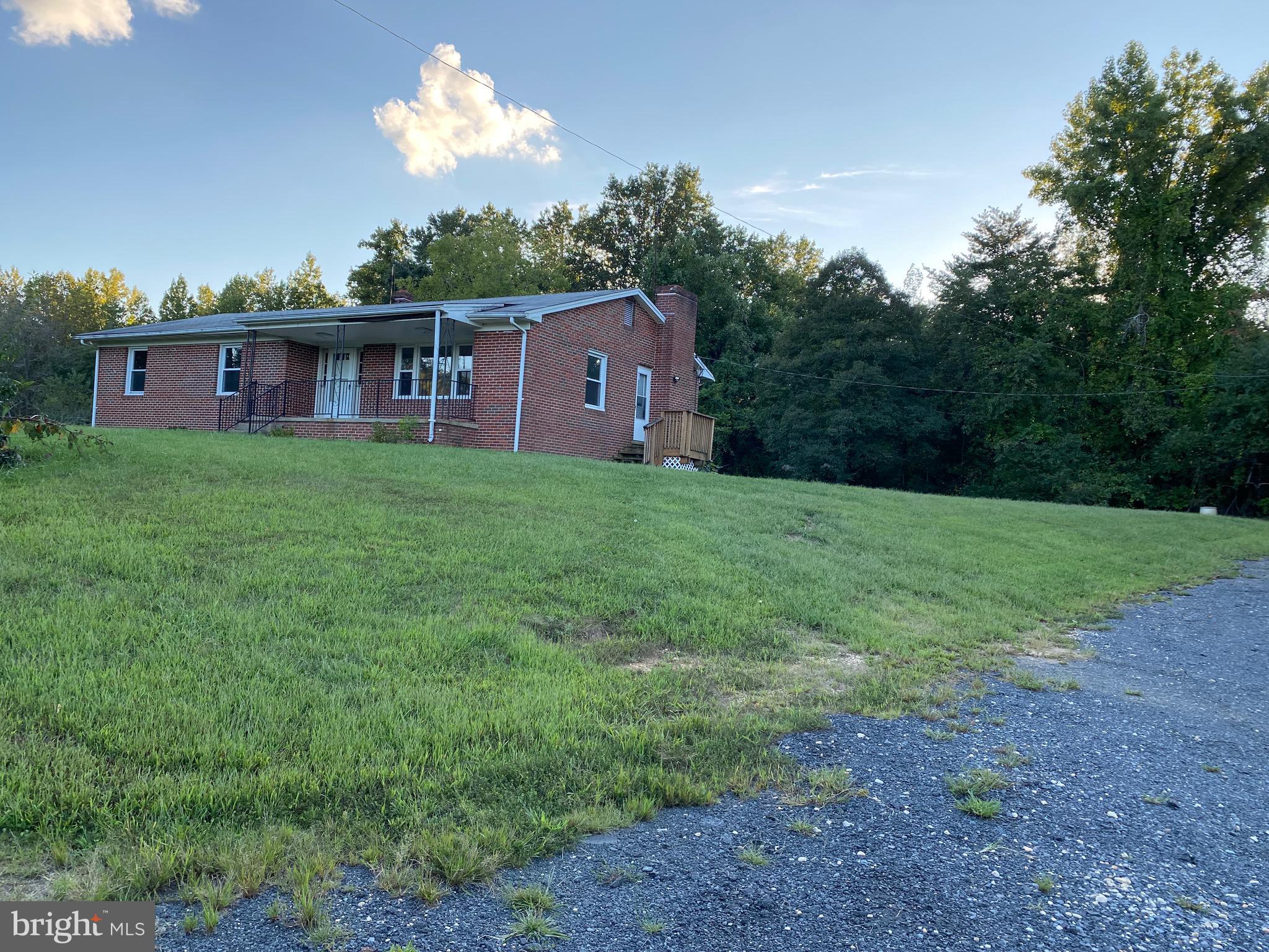 If you country living this one is for you.     Tucked way back down long  gravel one lane road.   Brick rambler with 3 bedrooms, 2 bath.  No  a/c and does have oil heat.  Kitchen new appliances, formal living room and formal dining room.  Wood floors.  Basement is a cellar with the washer & dryer with lots of storage space.  Pets case by case.