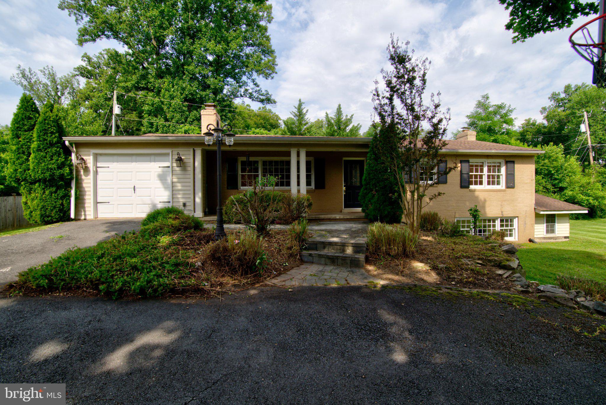 Opportunity awaits at 900 Walker Road in Great Falls. Being sold strictly "as is," this property offers exceptional potential for investors, builders, or buyers looking to renovate and make it their own. The home features the convenience of main-level living with three bedrooms and two full baths on the main level, plus a third full bath in the walk-up lower level. Hardwood floors run throughout the main level, and the kitchen was renovated in 2014, providing a great starting point for future updates. The lower level also includes the laundry area and offers excellent potential for renovation to create additional finished living space. 

Situated on a large corner lot with a one-car garage, this property is just minutes from Great Falls Village Centre, shopping, restaurants, parks, and top-rated schools. Whether you're planning a renovation, expansion, or new construction, this is a rare opportunity to invest in one of Northern Virginia's most desirable communities.