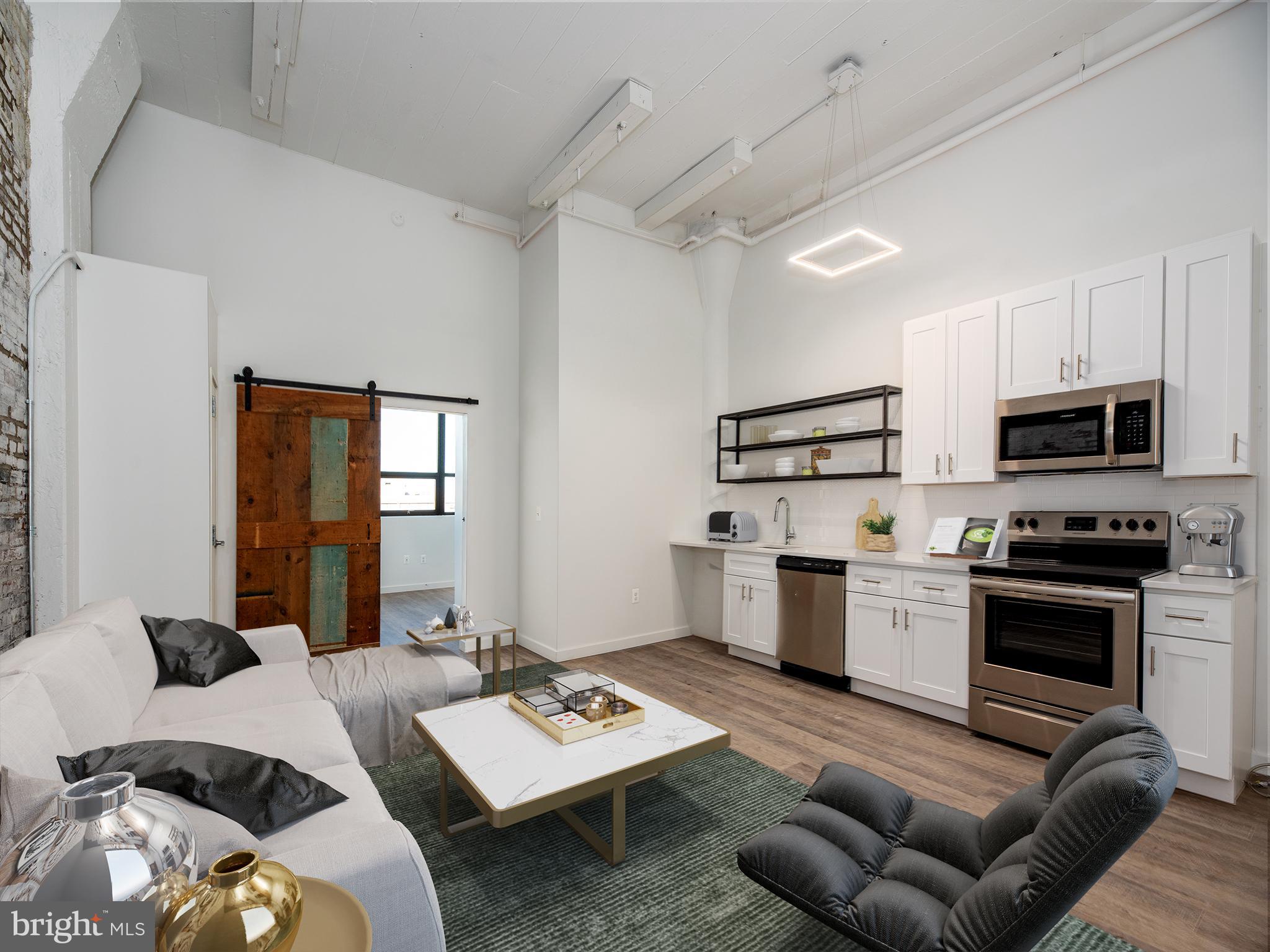 1201 Jackson is a thoughtfully designed community that caters to the wellness of both residents and the environment, The Brush Factory Lofts offer quality interiors, functional amenities, seamless indoor-outdoor spaces, and resource-conscious utilities. Marrying historic character with a modern sensibility, these legacy buildings invite you home to an uncommon urban living experience. Located on 12th and Jackson Streets in South Philadelphia, the Lofts offer residents neighborhood charm, proximity to sought-after destinations, and easy access to nearby transportation. This is the only apartment building of its kind in the area, featuring architectural, design, and lifestyle details that other nearby rentals can t match. This unique character is at the heart of the building s appeal to its residents, who desire to express their own unique individuality in their living space. Unit Amenities include Washer/dryer, Quartz countertops, Hardwood floors, Energy-efficient heating & cooling, massive windows, and unique industrial features such as exposed brick and original building columns. Building Amenities include: Carshare, Bike share, Media Room, Fitness Center, Roof Deck, Parking, Workspace area, Recreation room.

*Photos are of amenities and model units, availability subject to change