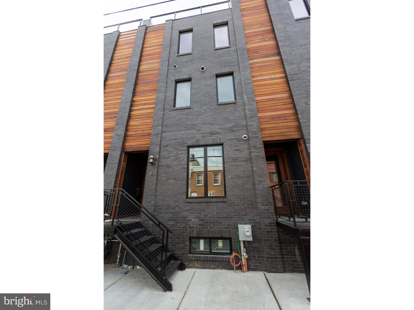 Brand new construction 3 bedroom home for rent in the new Moyer Street Court. Located in the heart of Fishtown, this urban community offers a secure gated courtyard layout with a private garage.  This stunning townhome includes 3 Bedrooms plus an office/den, 3.5 Baths, a private Garage, Full Basement, and open layout. The Custom Kitchen has a gigantic island, slow-close drawers, slate tile back splash, High Efficiency Stainless Steel Appliances, Energy Star Fridge & Dishwasher, Dual Stainless Sink with Long Neck Chef Style Faucet, Garbage disposal, gourmet vent hood,  and a beverage/wine cooler!  High efficiency HVAC, Energy Star Recessed lighting, and washer and dryer already installed. There is also a tankless Gas Fired Hot Water Heater, Kohler Dual Flush Toilets, and Wide Plank Hardwood Floors. Property also has a green roof top deck with views of center city! This is a must see unit. Pets must be approved with landlord, only cats and small dogs under 35lbs with $500 non-refundable pet deposit.  We welcome your visit!