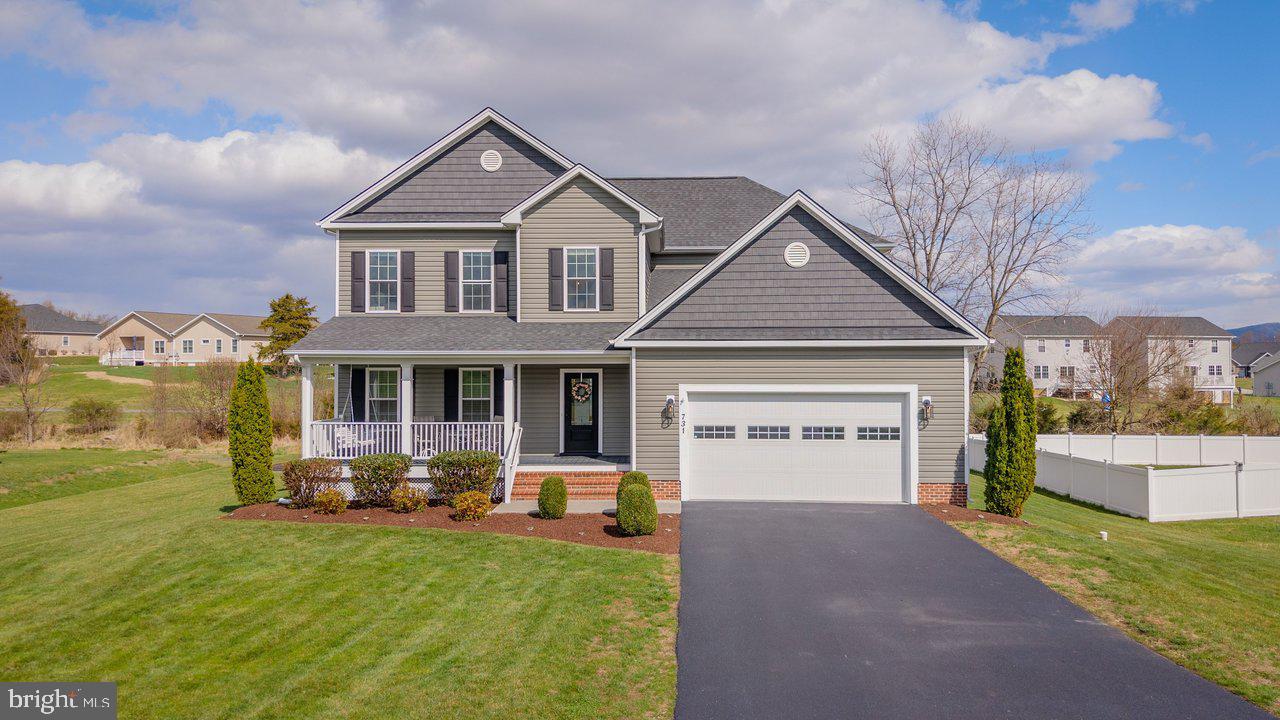 Space, style, and mountain views come together beautifully in this gorgeous home in Overbrook. This 5-bedroom, 4-bathroom home offers 3,800 finished square feet of thoughtfully designed living space, perfect for those ready to spread out and settle in. From the moment you step inside, you'll notice the details: 9-foot ceilings, hardwood floors, crown molding, and shiplap accents throughout. The open-concept main level features a cozy gas fireplace and a kitchen built for gathering, granite counters, gas range, walk-in pantry, and soft-close cabinetry. A main-level bedroom with full bath nearby adds flexibility--could also be used as home office. Upstairs, the owner's suite is your private retreat with two walk-in closets, jetted tub, double vanity, and mountain views. The finished basement adds a large rec room, full bath, bedroom, and generous storage. Outdoor living on two levels includes a composite deck and covered patio below. Located just 15 minutes from Harrisonburg and minutes from Massanutten and Shenandoah National Park, you'll enjoy the best of valley living with convenience close by.