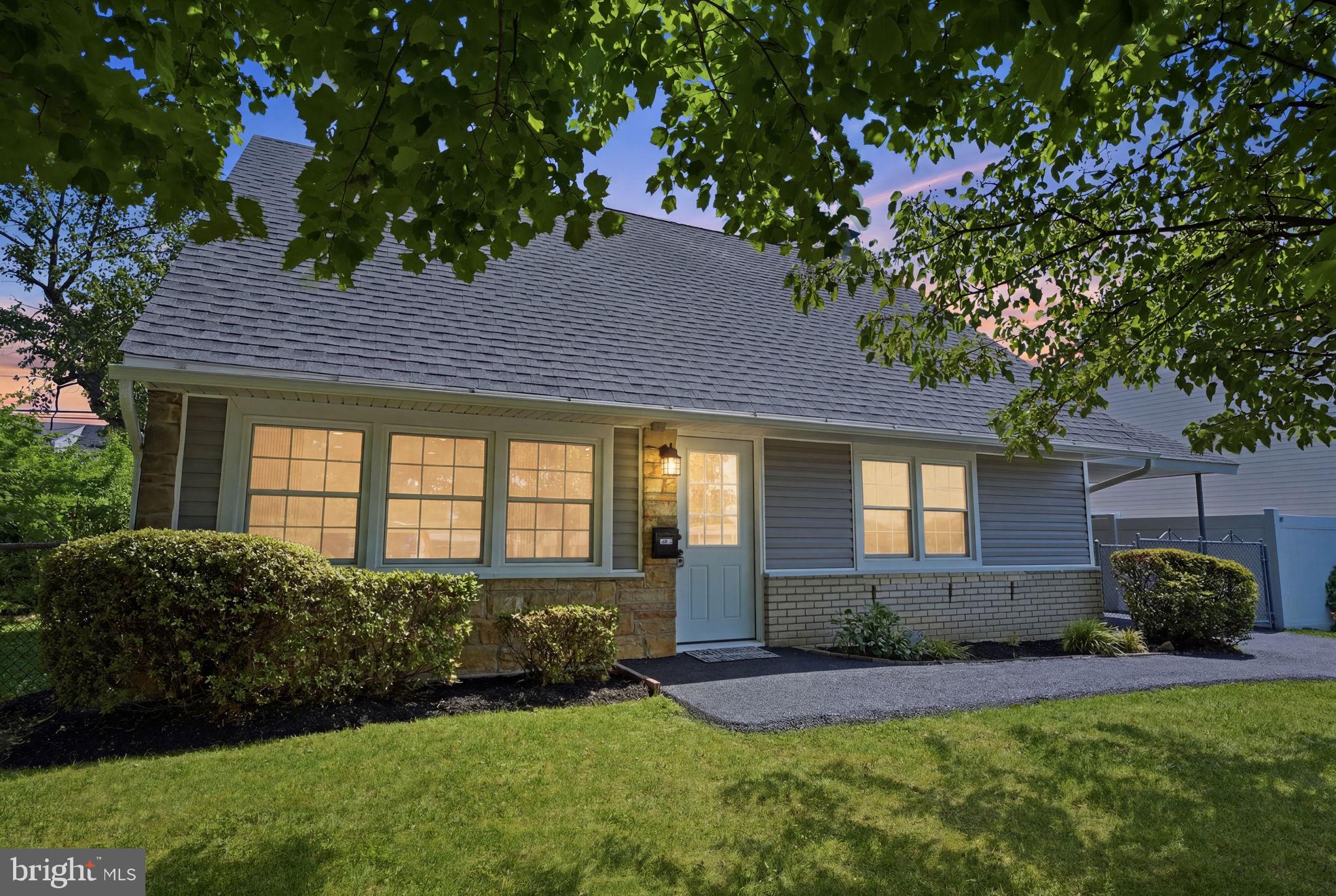 Welcome to this beautifully renovated 4-bedroom, 2 full bathroom home located in the desirable Normandy subdivision of Northeast Philadelphia. Every detail has been thoughtfully updated, offering the perfect blend of modern style and everyday comfort. The stunning new kitchen features elegant cabinetry, beautiful Calacatta granite countertops, a spacious center island, and plenty of cabinet space—ideal for cooking and entertaining. The open living area is enhanced by a striking multi-color electric fireplace with modern decorative wall trim, creating a warm and contemporary atmosphere. Recent renovations include a brand-new roof, new siding, new windows, new driveway, brand-new central HVAC system, recessed and modern ceiling lighting throughout, beautifully updated bathrooms, and stylish finishes from top to bottom. This move-in-ready home offers exceptional quality and craftsmanship with nothing left to do but unpack. Conveniently located with easy access to Roosevelt Boulevard, I-95, major shopping centers, restaurants, schools, and public transportation, this home combines modern living with an unbeatable location.