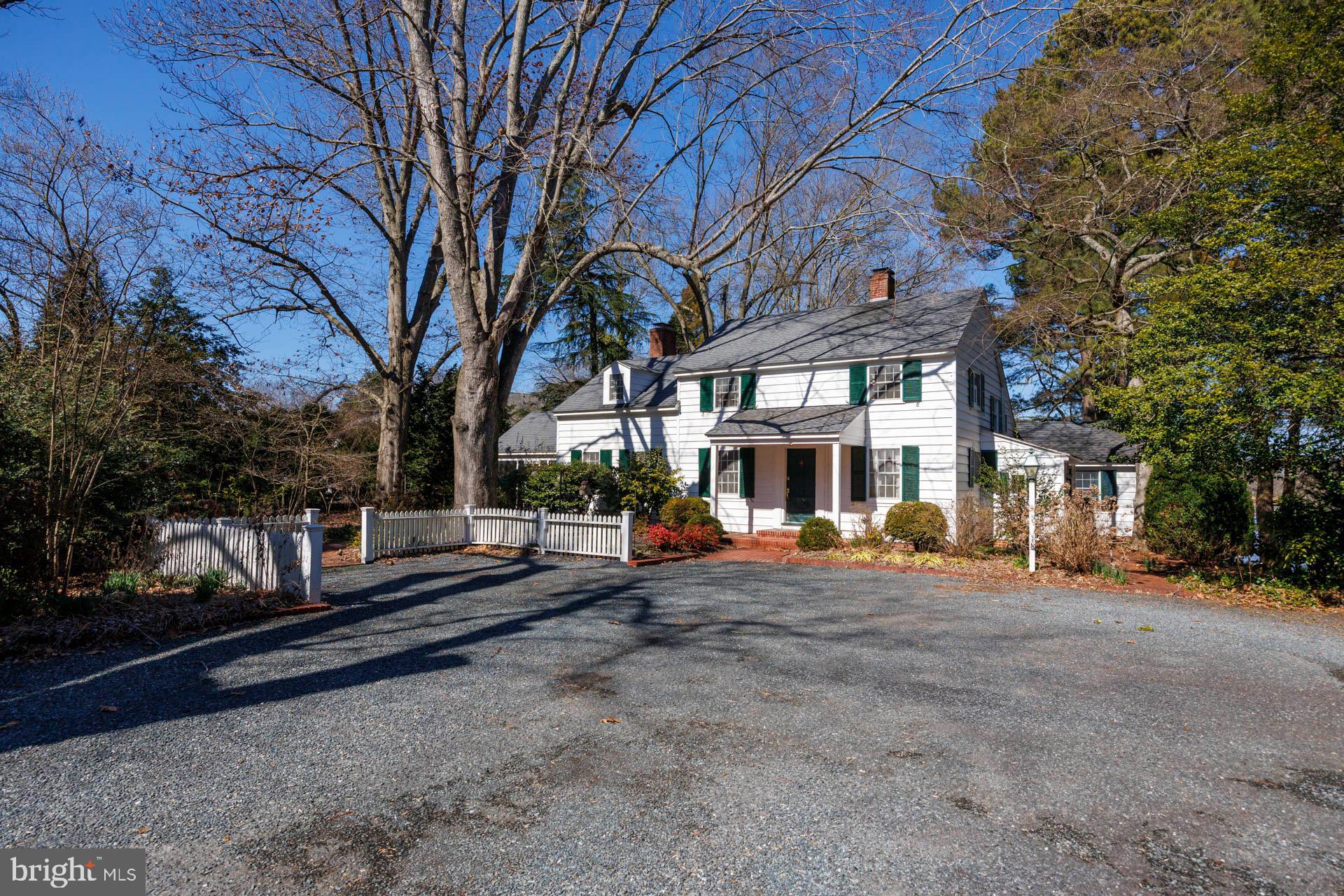 Oxford Road Waterfront Cottage. This 1940’s bungalow exudes character, featuring original mill working, hardwood flooring throughout, 4 bedrooms, large family room with wood burning fireplace, 16’ x 16’ screened porch with brick flooring, first floor bedroom and bath, sunroom. Second floor includes 3 bedrooms and a full bath. The 3.216+/- Acre property includes a detached 2 car garage. Property has been in the same family since the 1930’s and the owners were gardeners…planting and maintaining the trees, brick walkways, gardens and landscaping. Great location, elevation and views of Trippe Creek. It is ready for you to update and make your own. Selling As-Is.